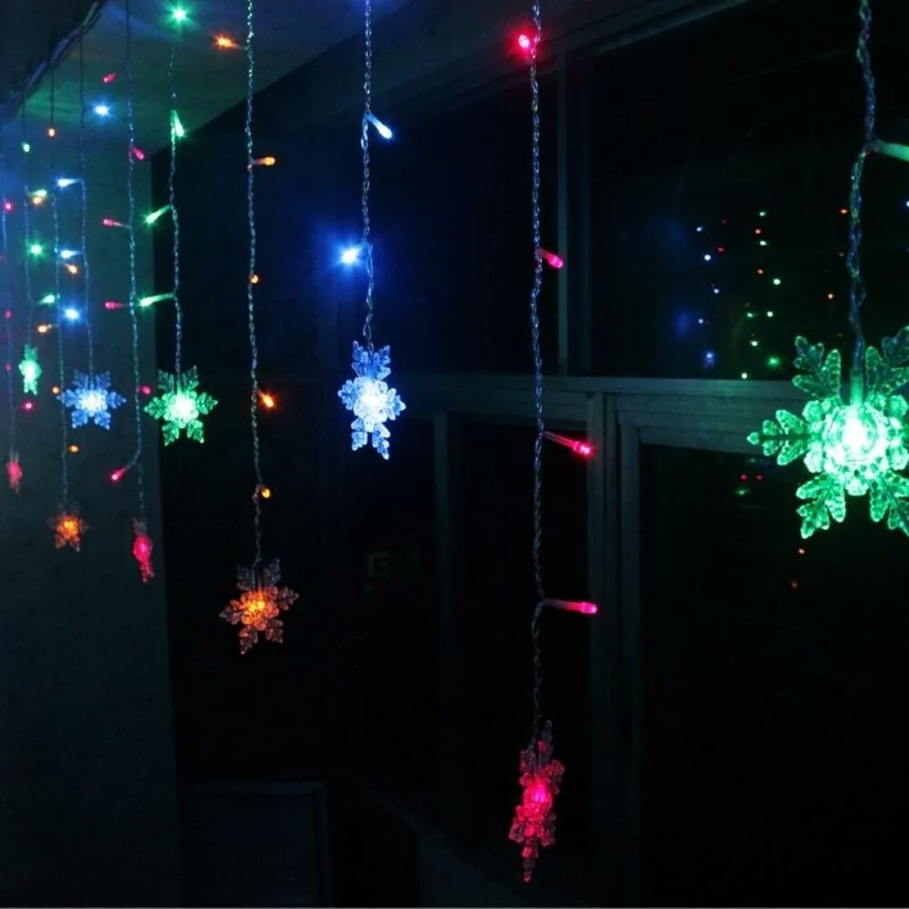 ALEKO Christmas Snowflake Drop Icicle Twinkle 80 LED Lights 5.25 ft Multicolored