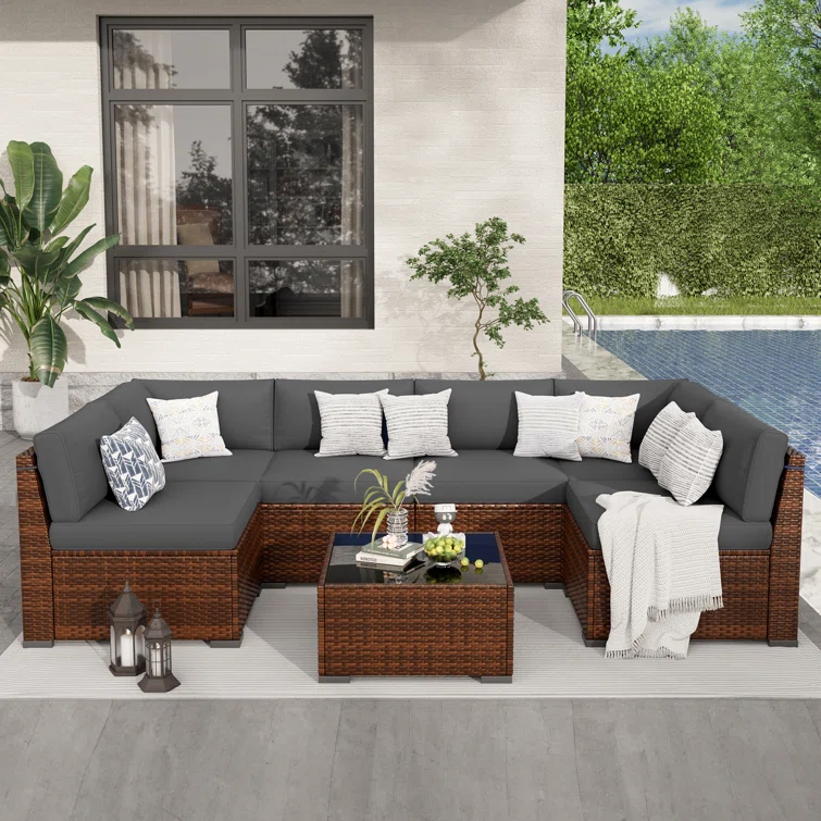 7 Piece Rattan Sectional Seating Group with Cushions