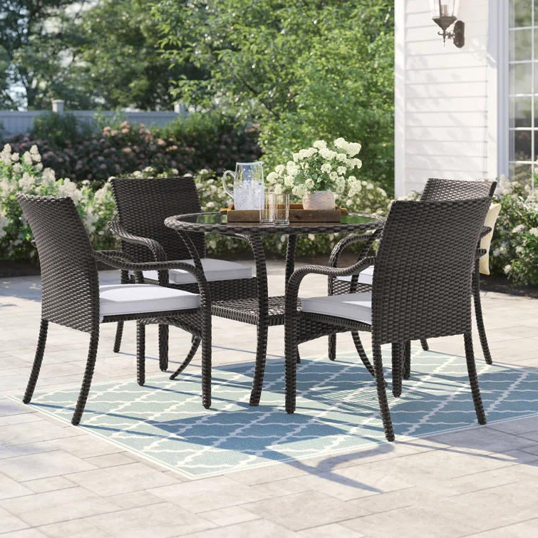 Tahirul 4 - Person Round Outdoor Dining Set with Cushions