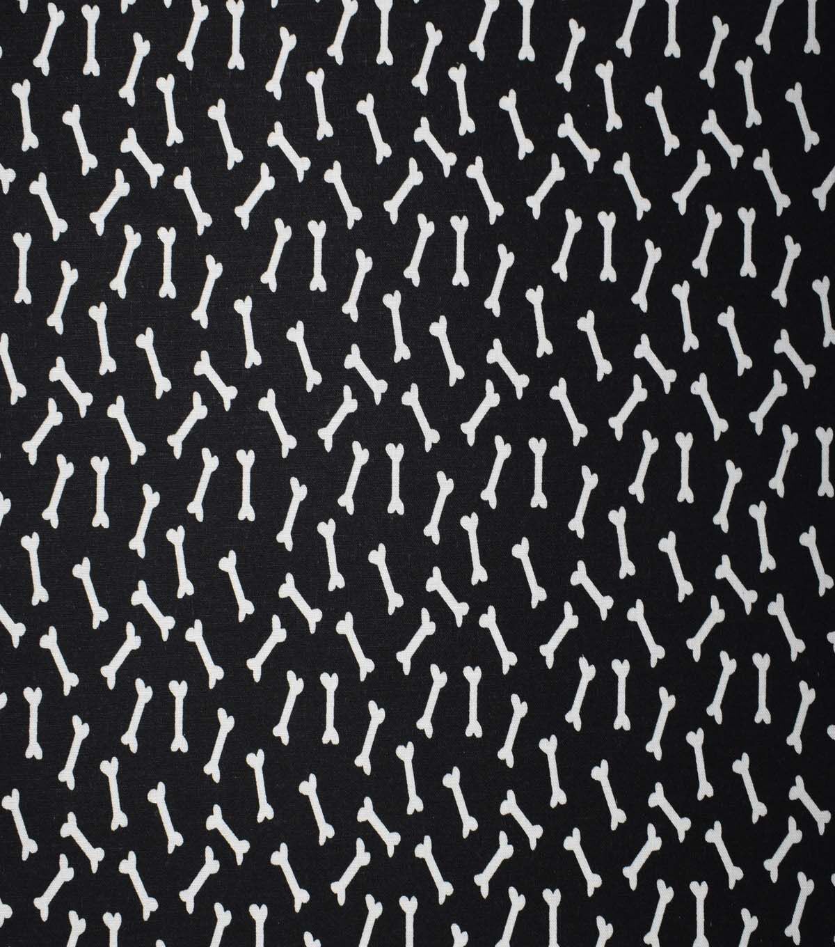 Dog Bones on Black Cotton Fabric by Quilter's Showcase