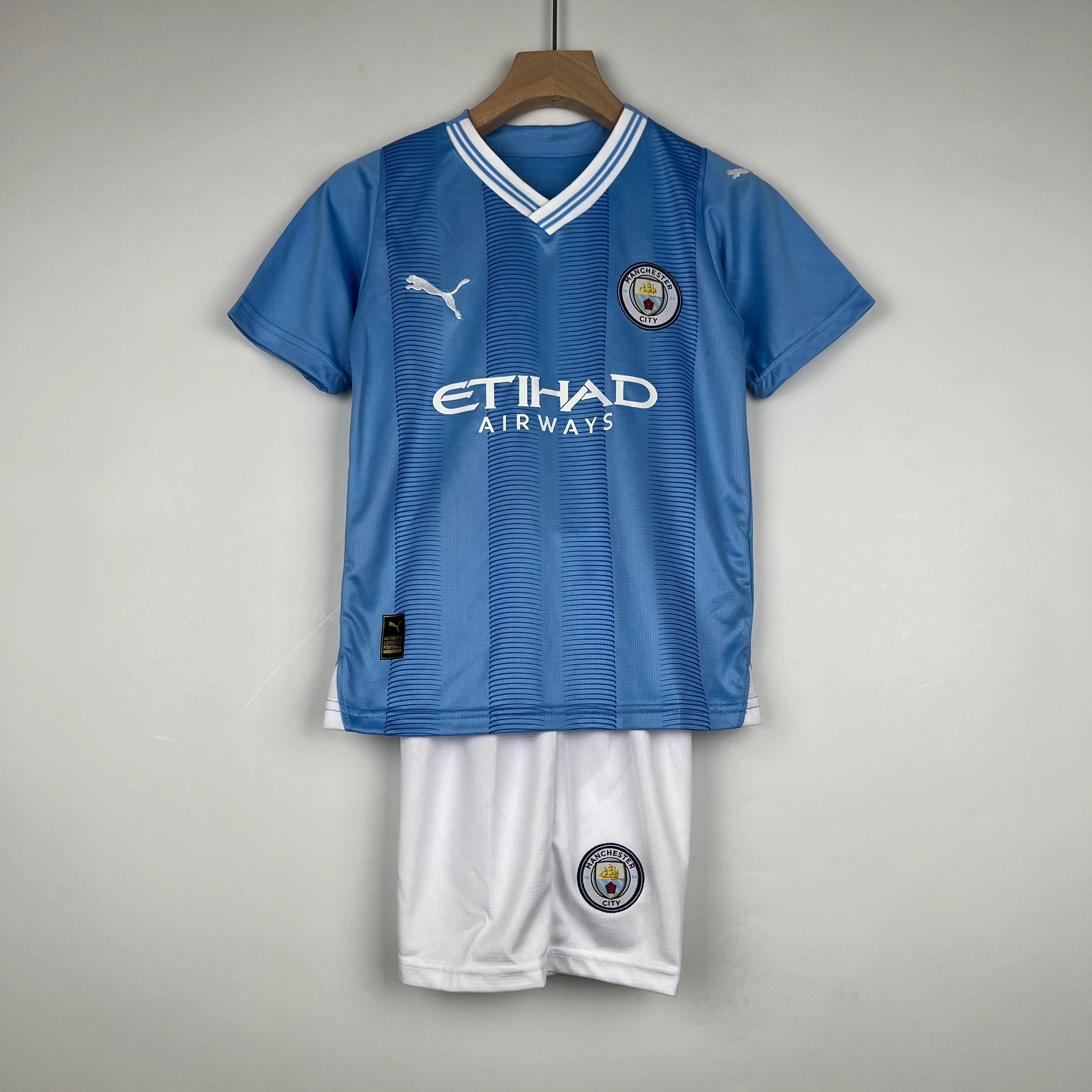KIT INFANTIL DO MANCHESTER CITY 23/24 PRINCIPAL