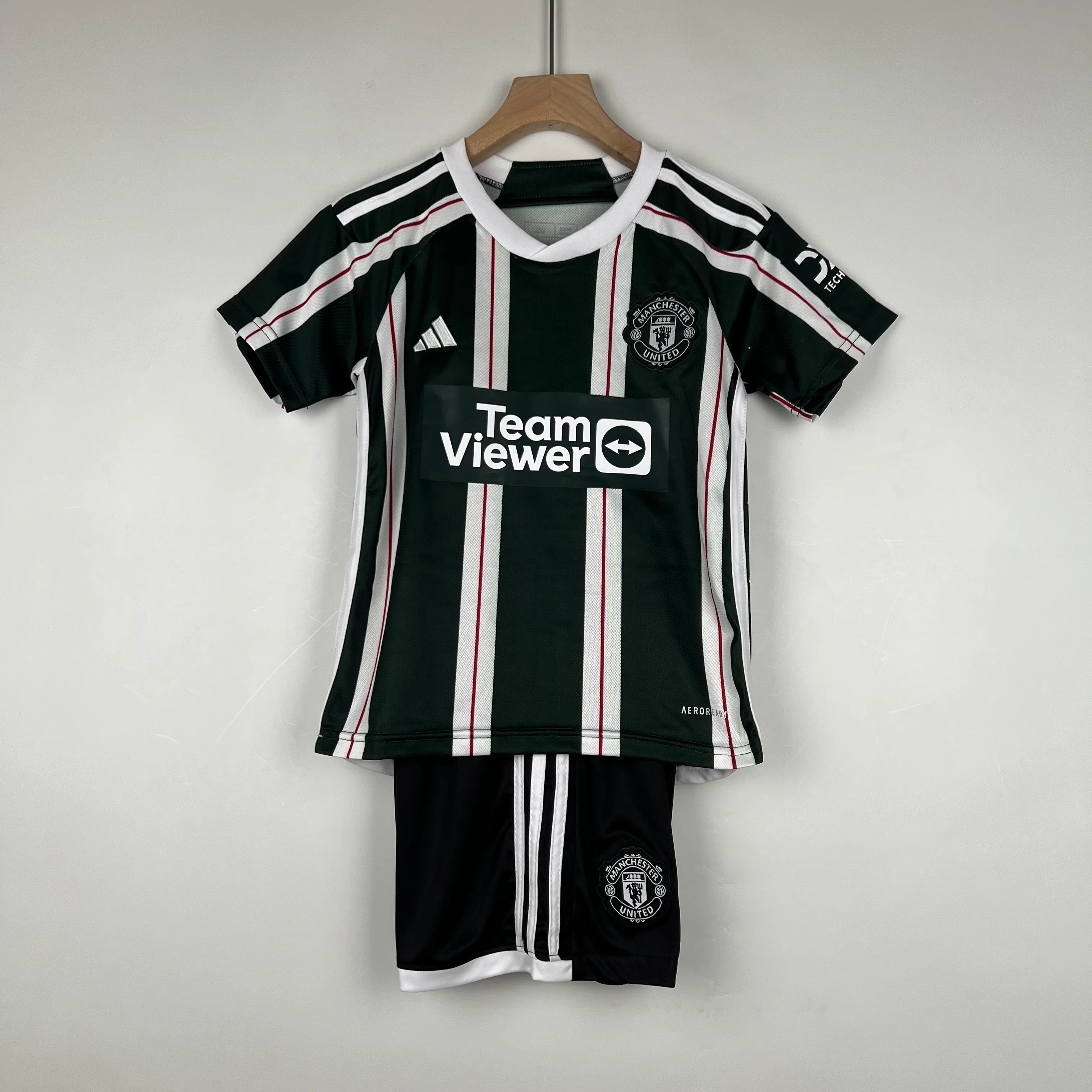 KIT INFANTIL DO MANCHESTER UNITED 23/24 ALTERNATIVA