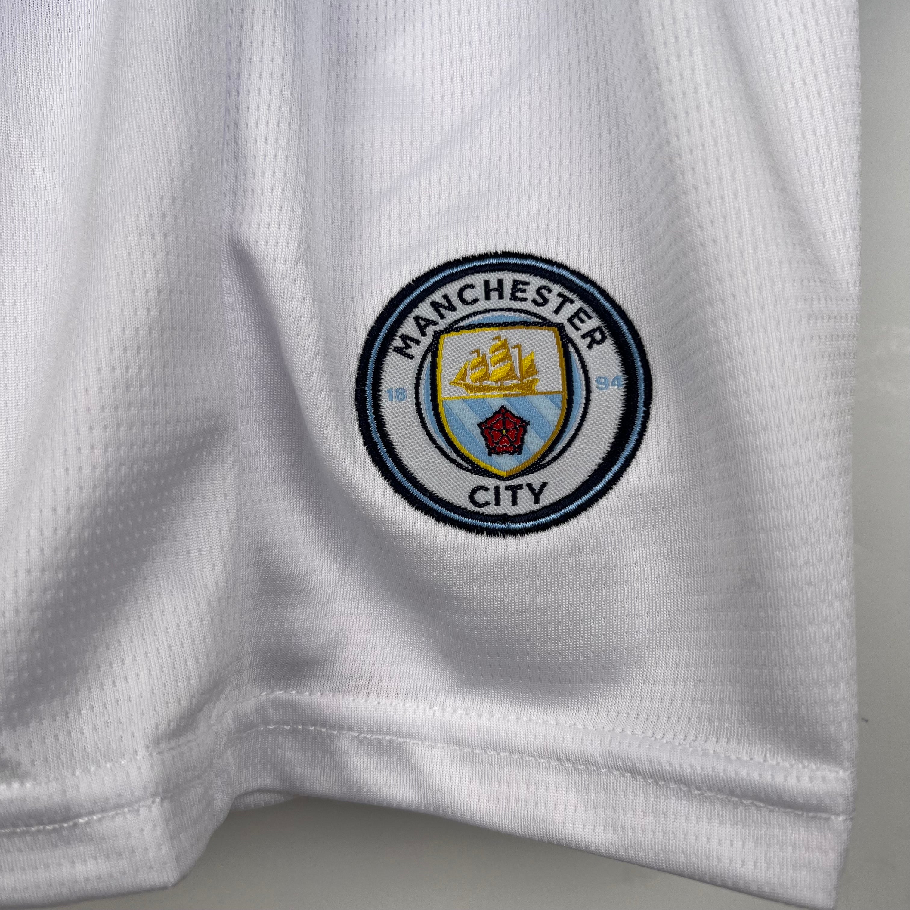 KIT INFANTIL DO MANCHESTER CITY 23/24 PRINCIPAL
