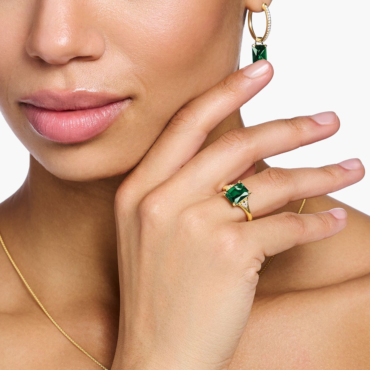 Ring with green and white stones gold plated