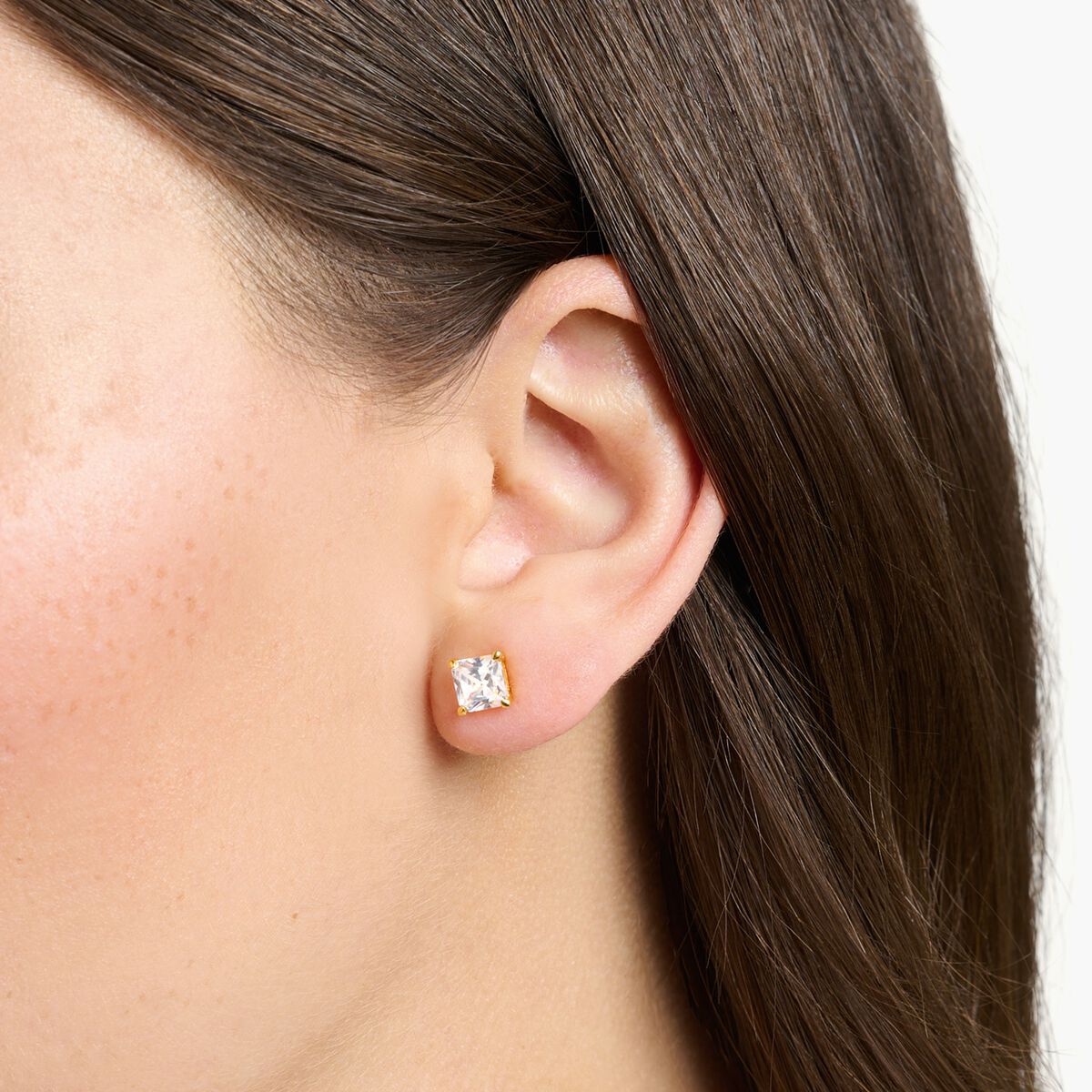 Ear studs with white stone gold plated