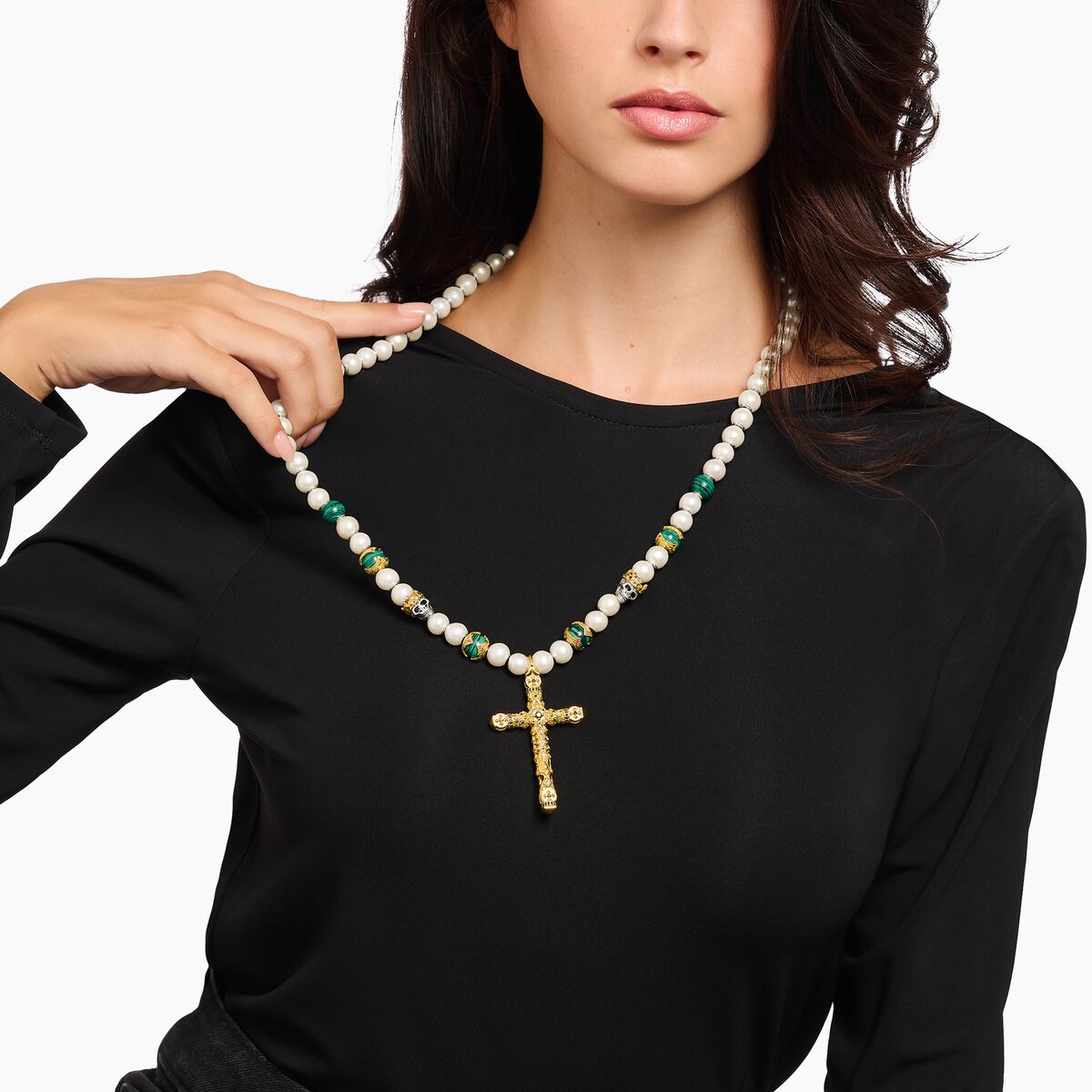 Gold-plated necklace made of different beads with cross pendant