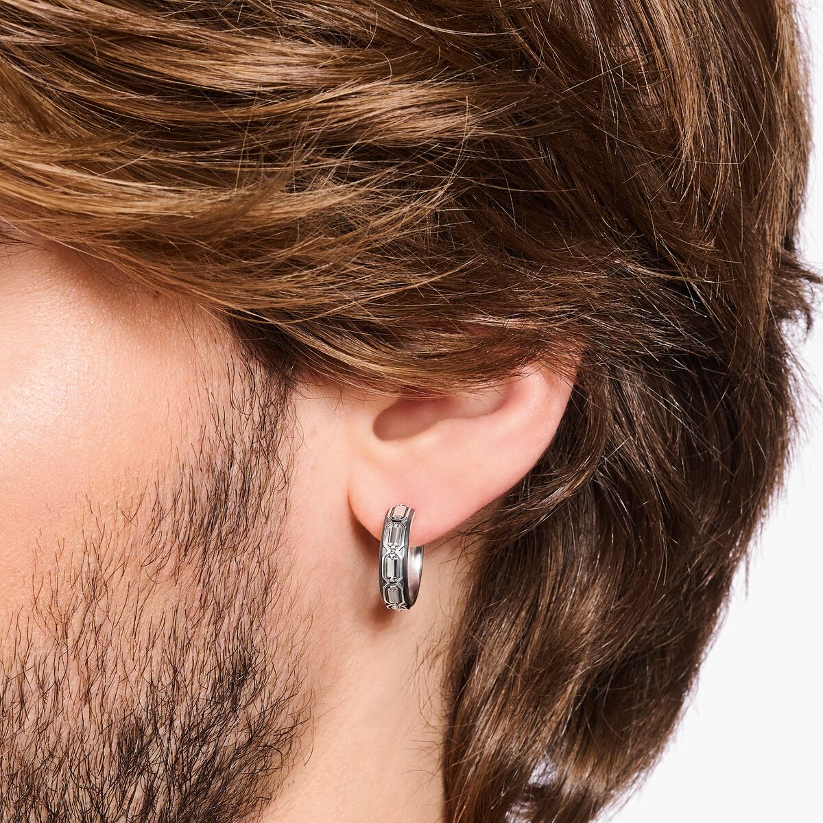 Blackened silver hoop ear rings crocodile shell structure
