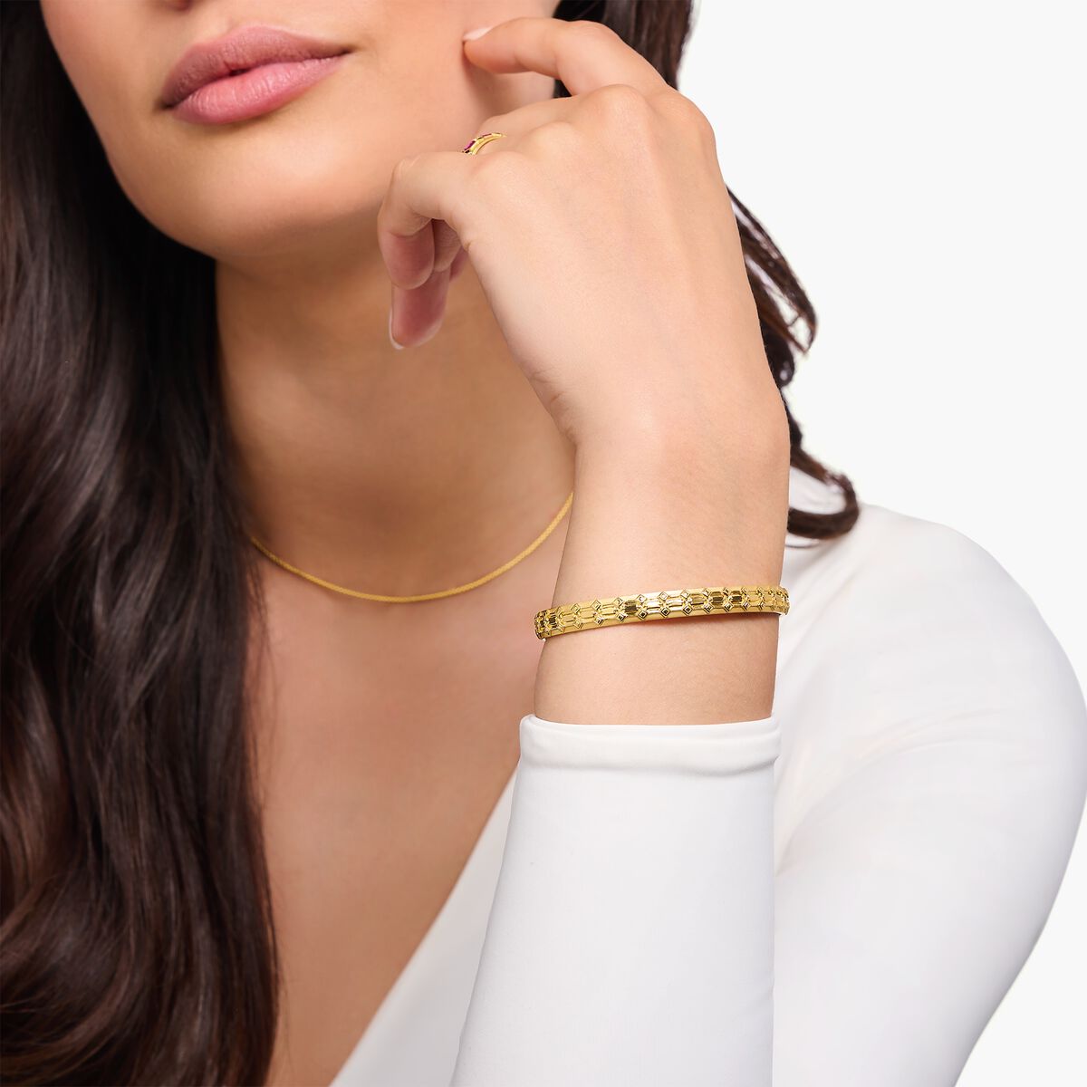 Yellow-gold wide bangle with crocodile detailing