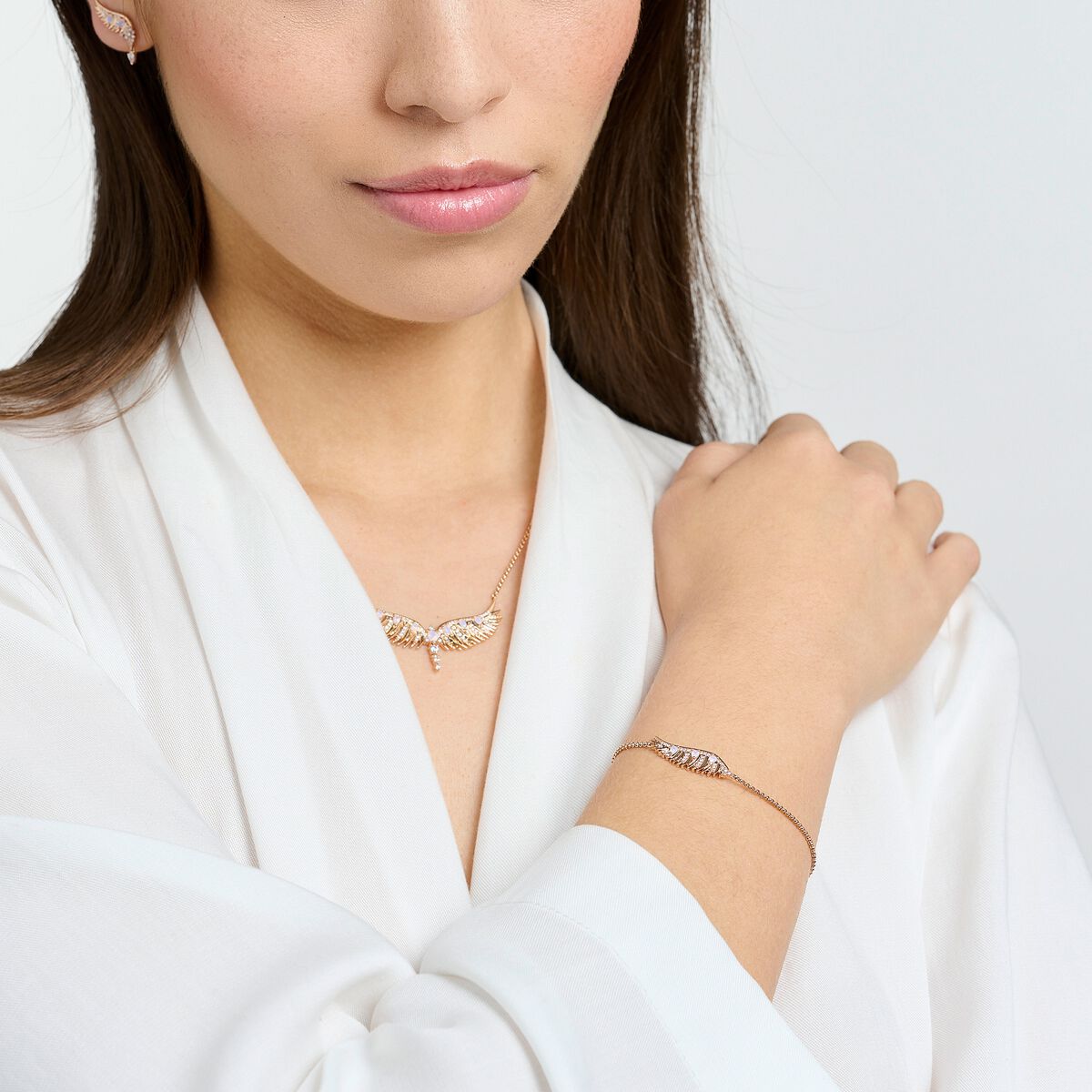 Bracelet phoenix wing with pink stones rose gold