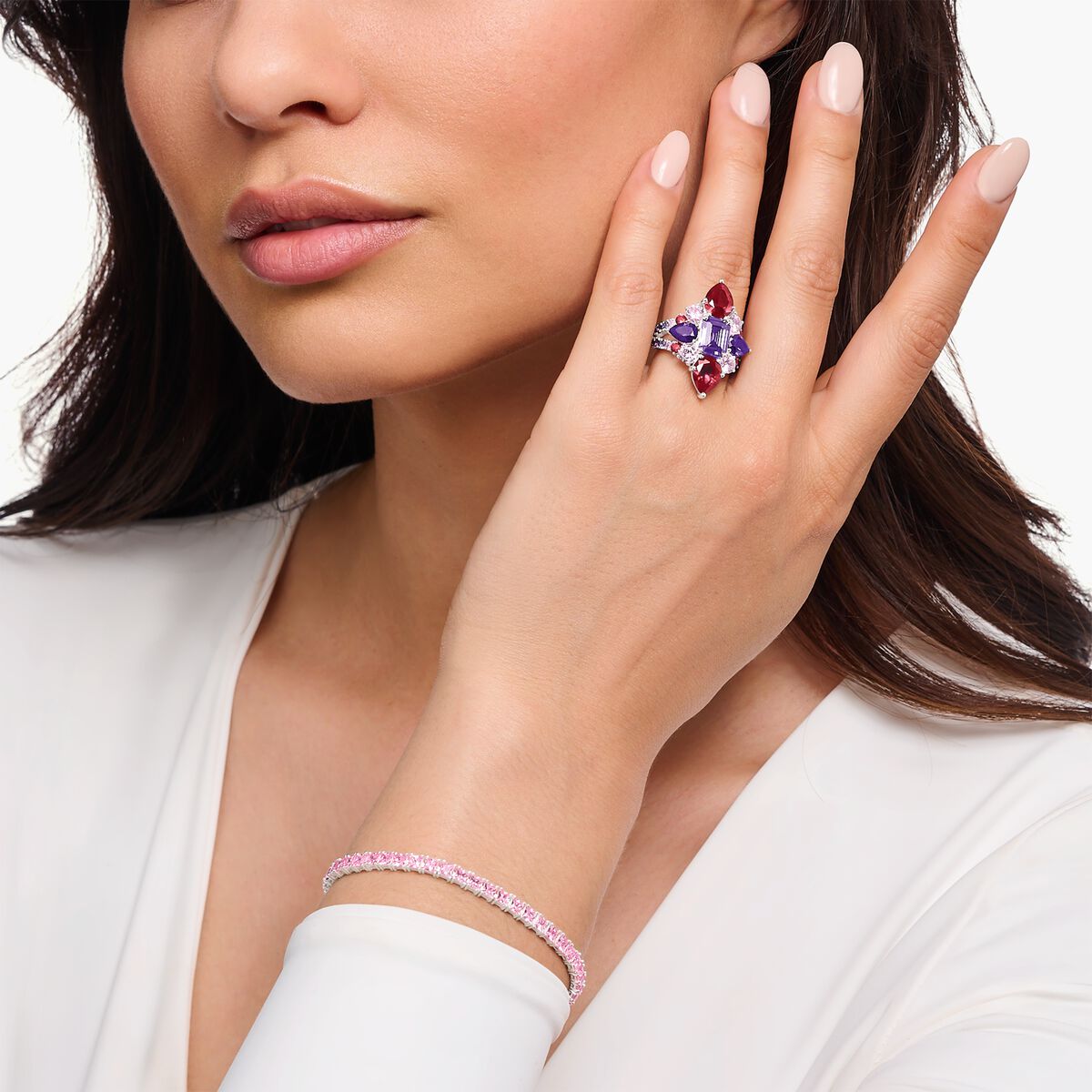 Silver cocktail ring with red, pink and violet zirconia stones