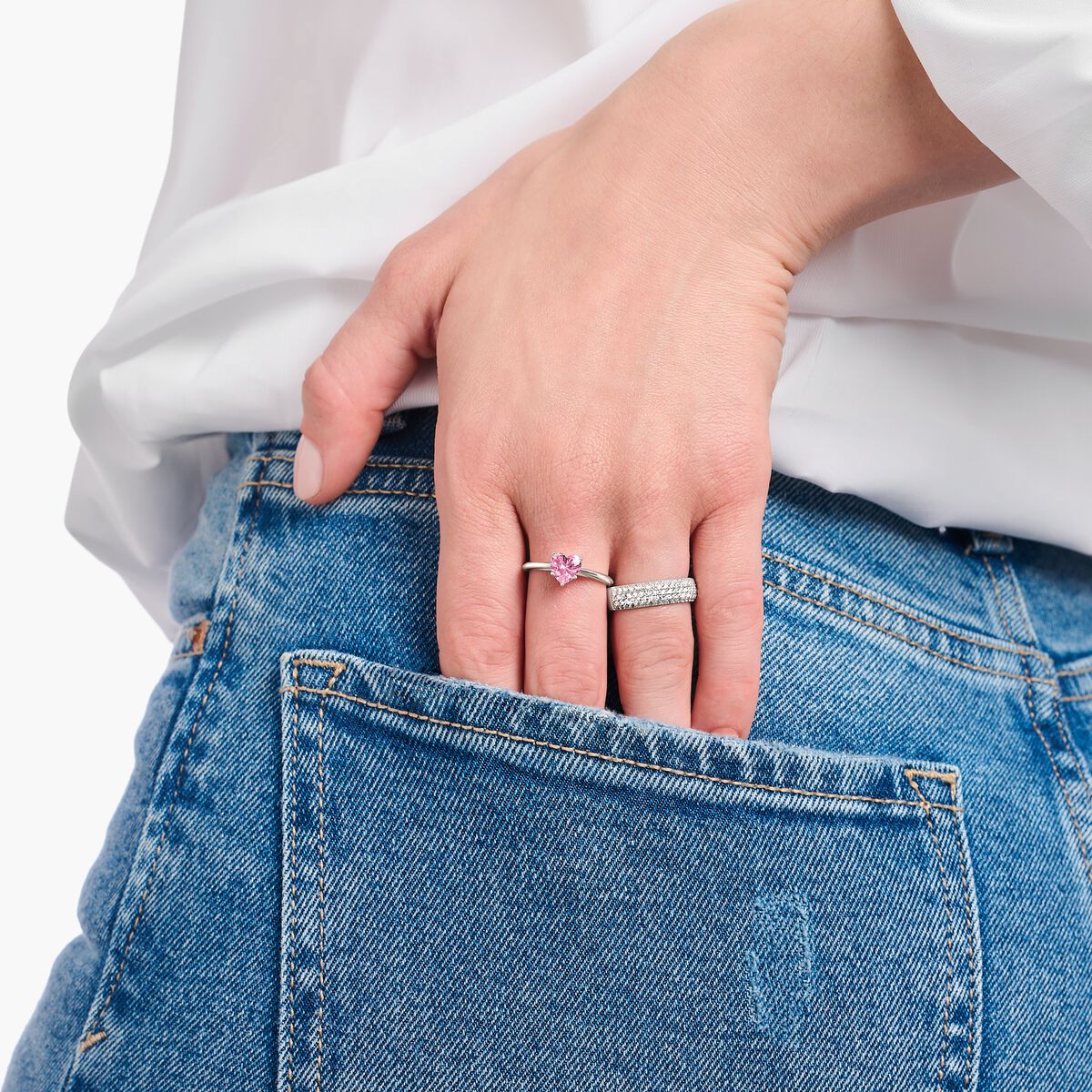 Silver ring with pink, heart-shaped zirconia