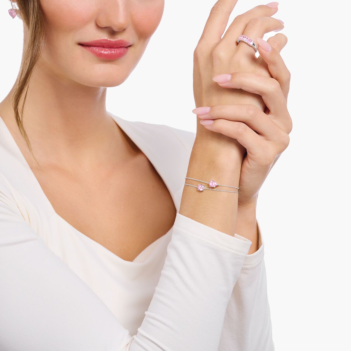 Silver bracelet with pink zirconia pendant