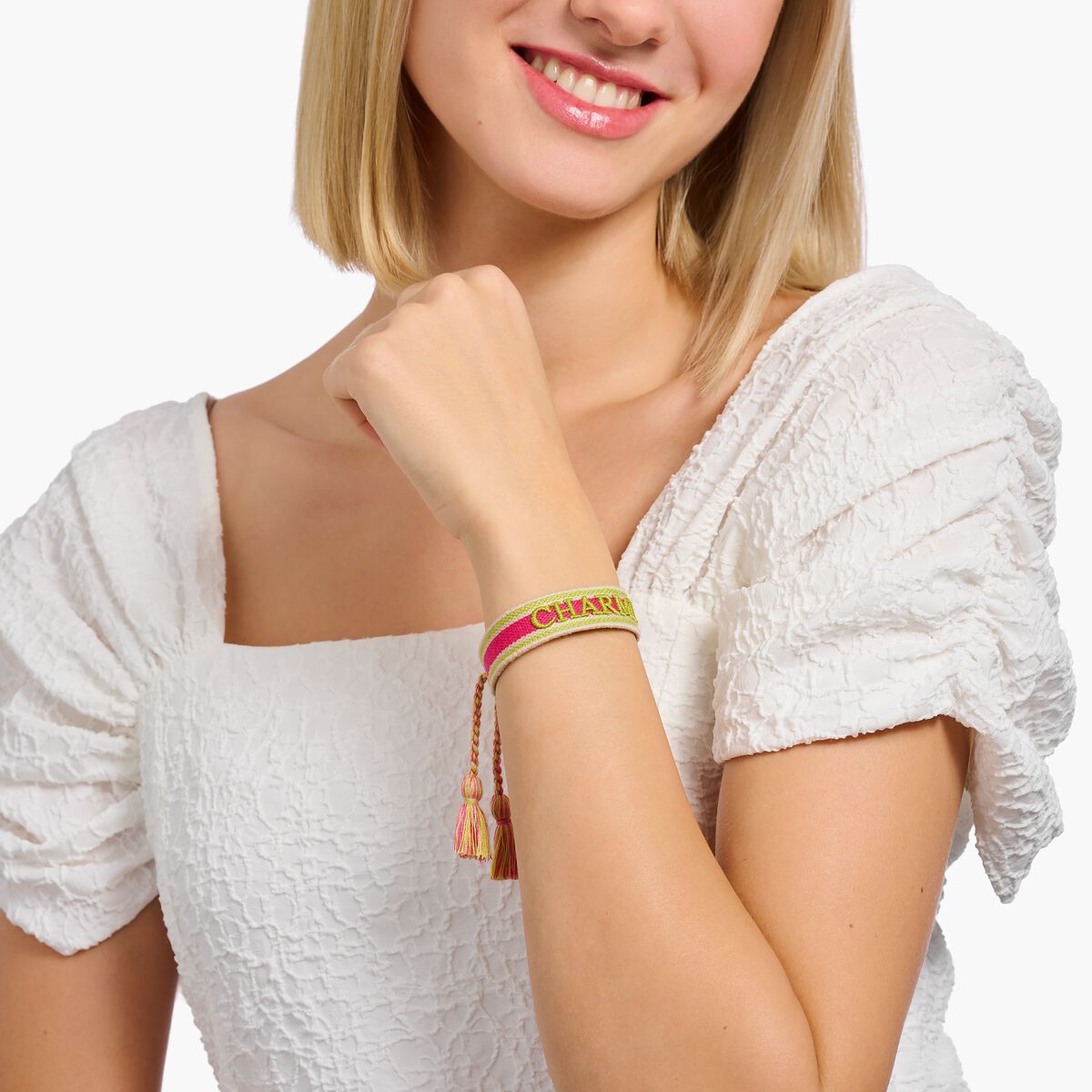 Woven bracelet CHARMISTA in pink, green & orange
