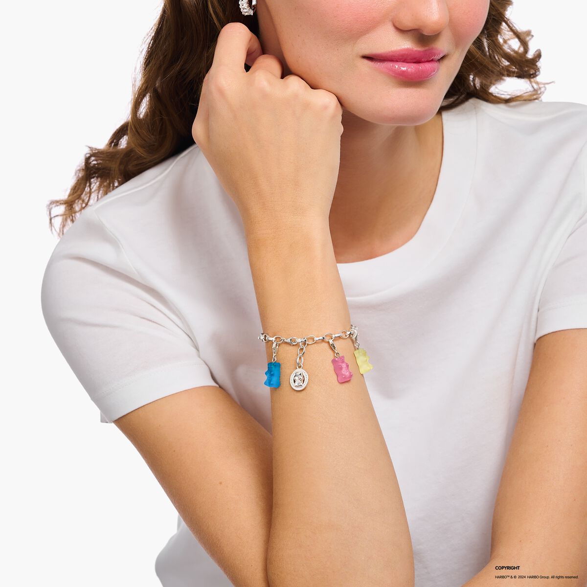 Silver charm bracelet with goldbears logo ring
