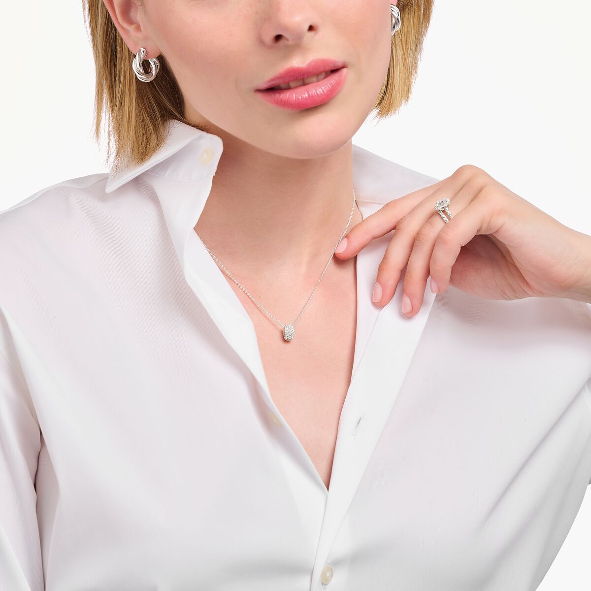 Silver necklace with ring pendant and white zirconia