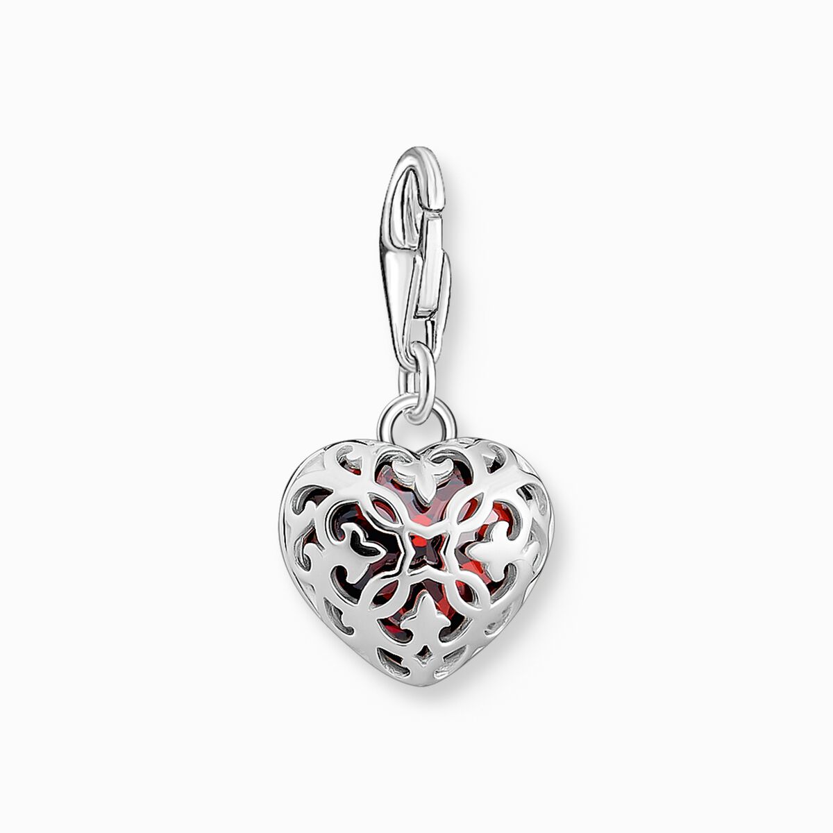 Silver charm pendant with red stone in heart-shape