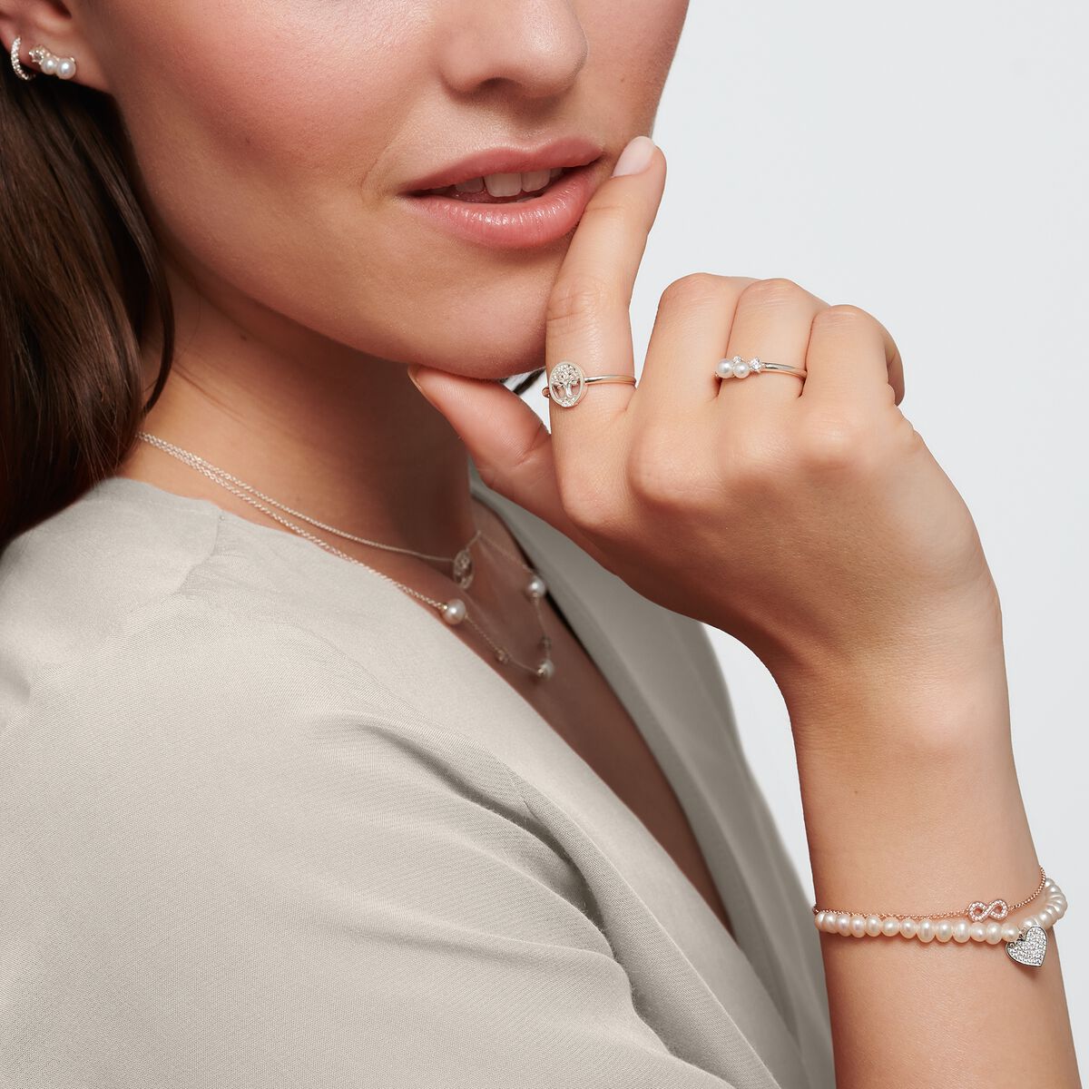 Ring pearls with white stones silver