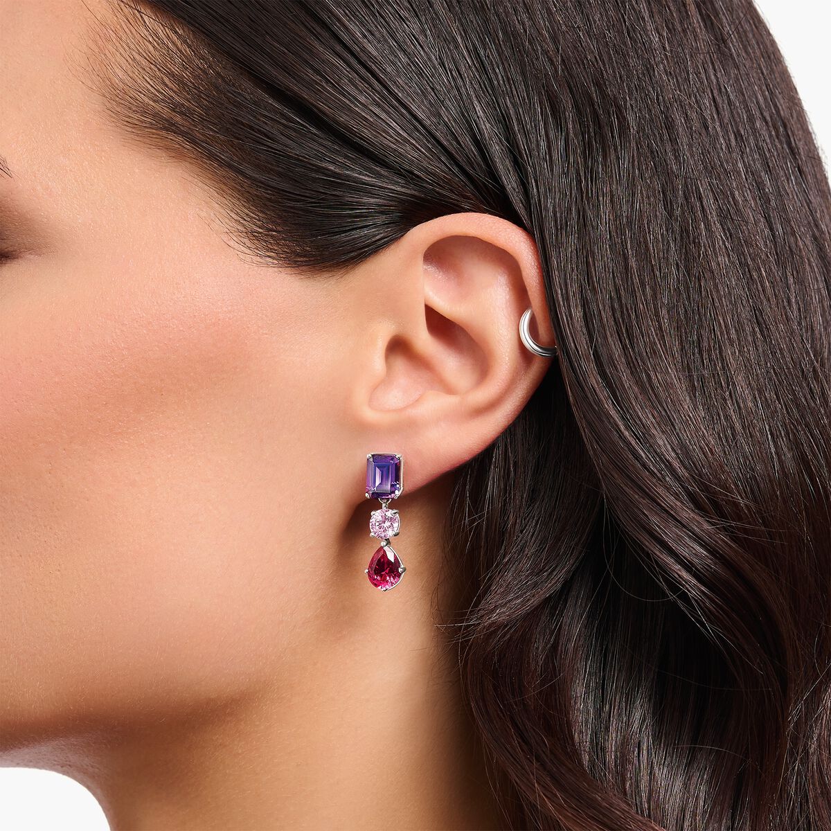 Silver earrings with red, pink and violet stones in various cuts