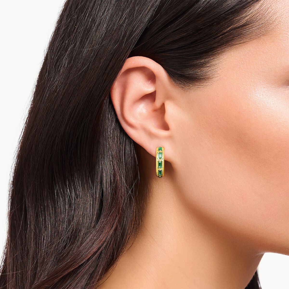 Yellow-gold plated hoop earrings with green stones