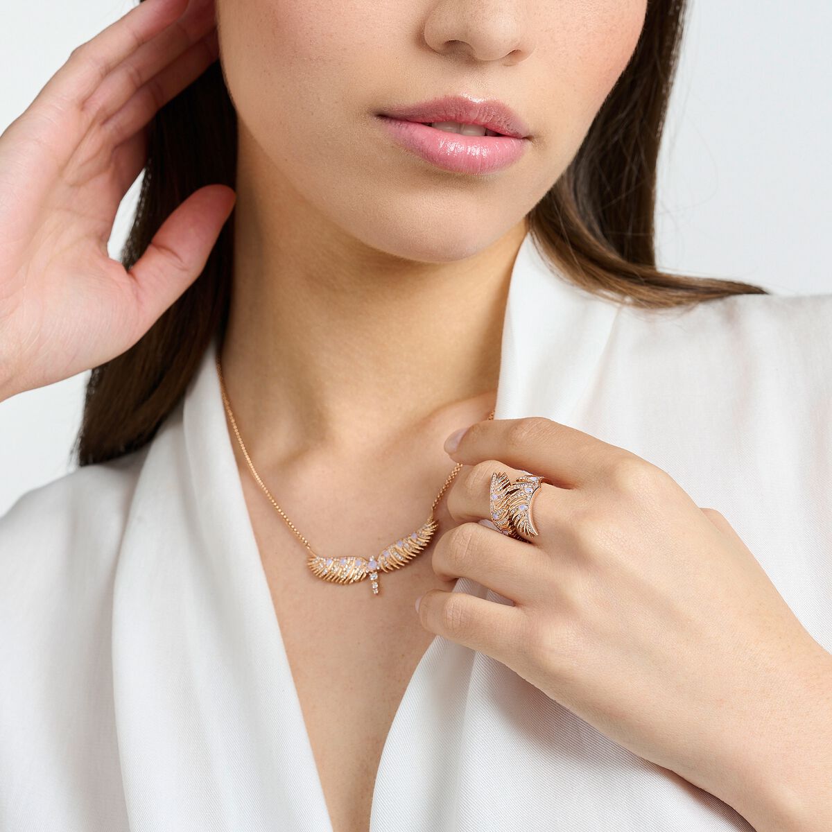 Ring phoenix wing with pink stones rose gold