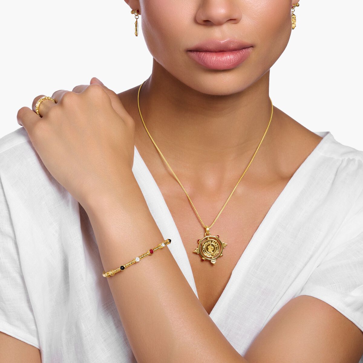 Bangle rope with white and black stones gold plated