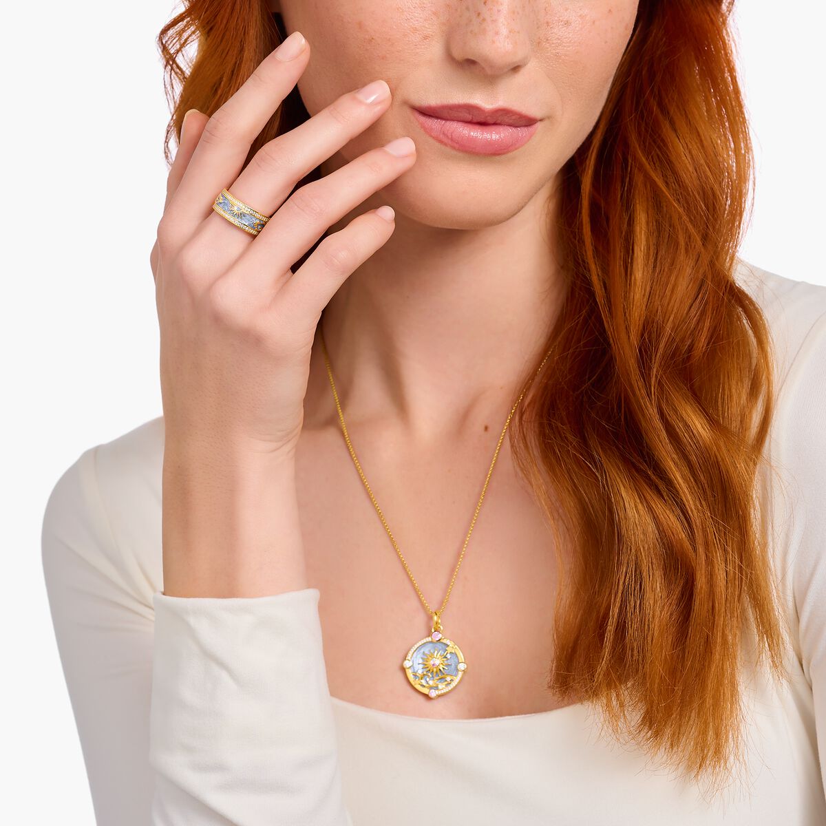 Gold-plated band ring with blue cold enamel and cosmic symbols