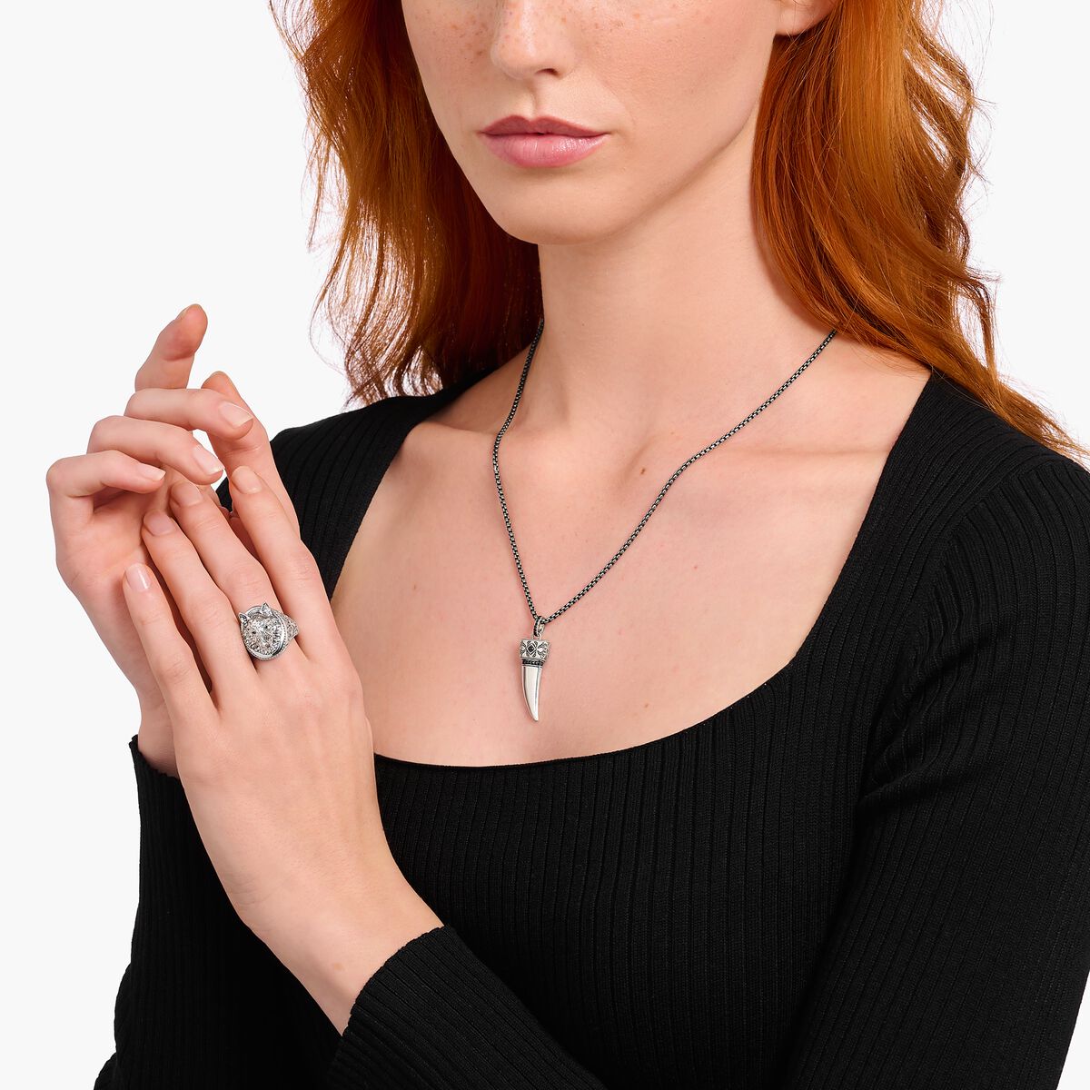 Silver blackened necklace with wolf's tooth pendant and stones