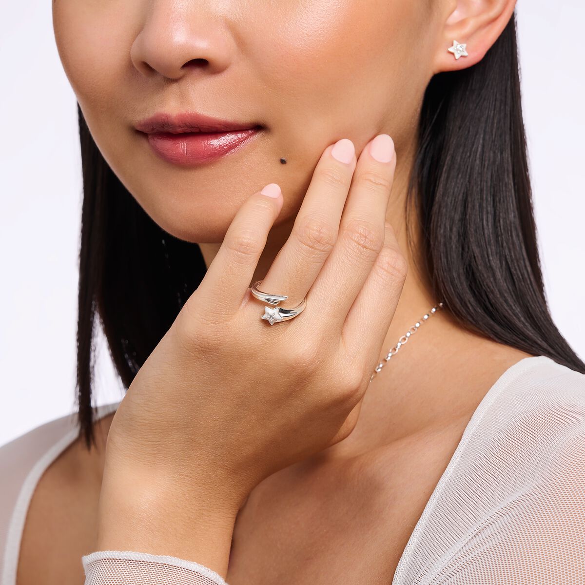 Ring with white stones and white cold enamel silver