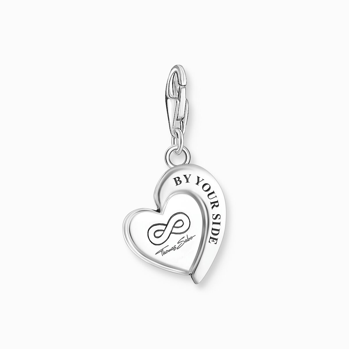 Silver charm pendant in heart-shape with engraving