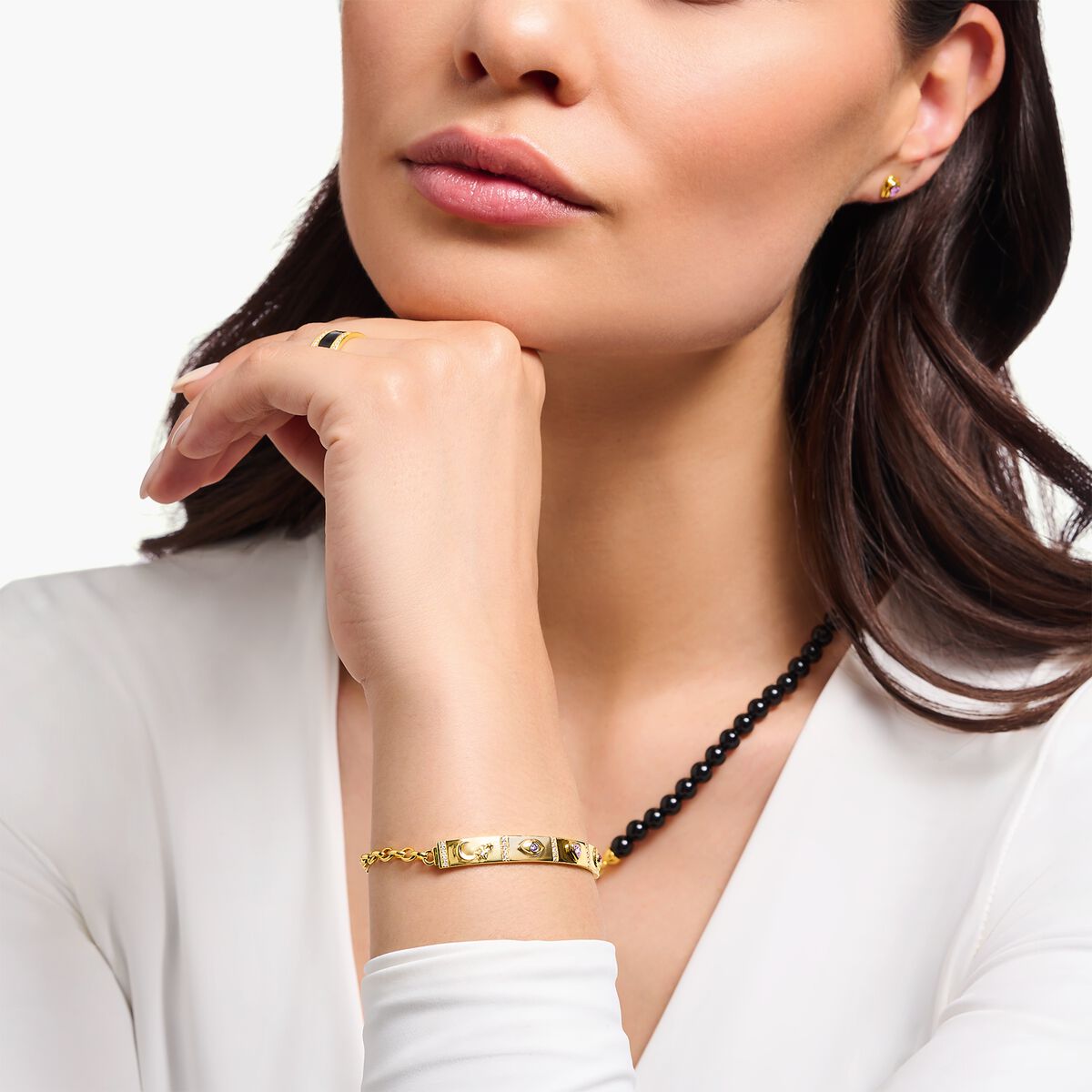 Yellow-gold plated bracelet with long bridge and various stones