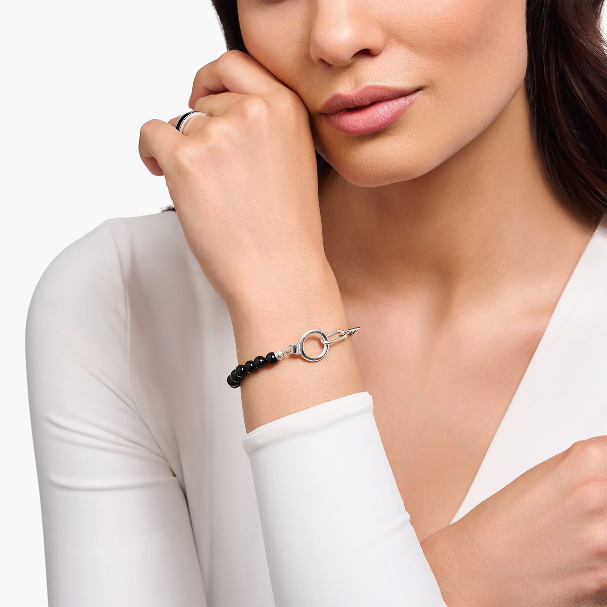 Silver bracelet with onyx beads and white zirconia