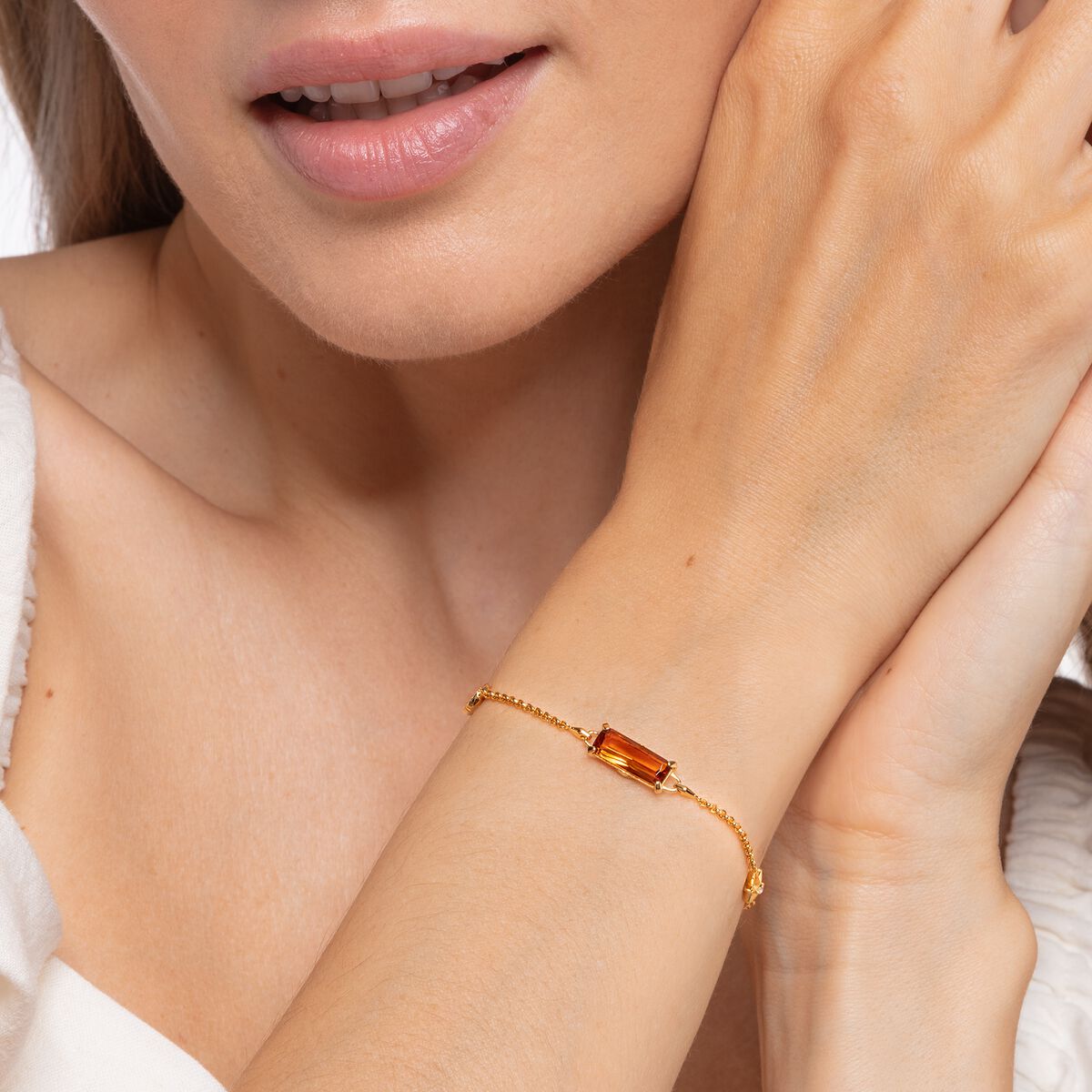 Bracelet orange stone with moon and star gold plated