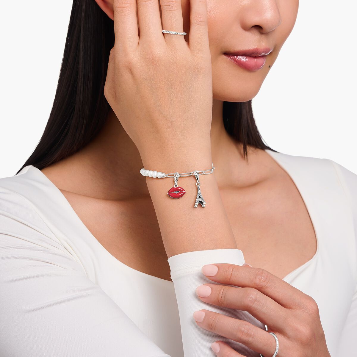 Charm bracelet with white pearls and Coin silver
