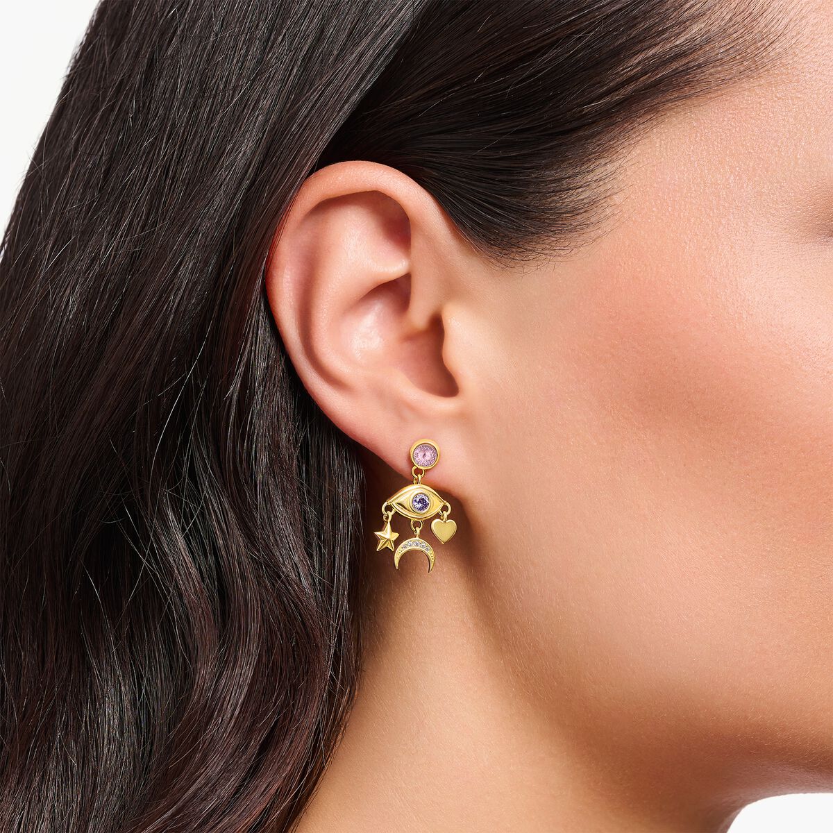 Yellow-gold plated earrings with stylised eye and various stones