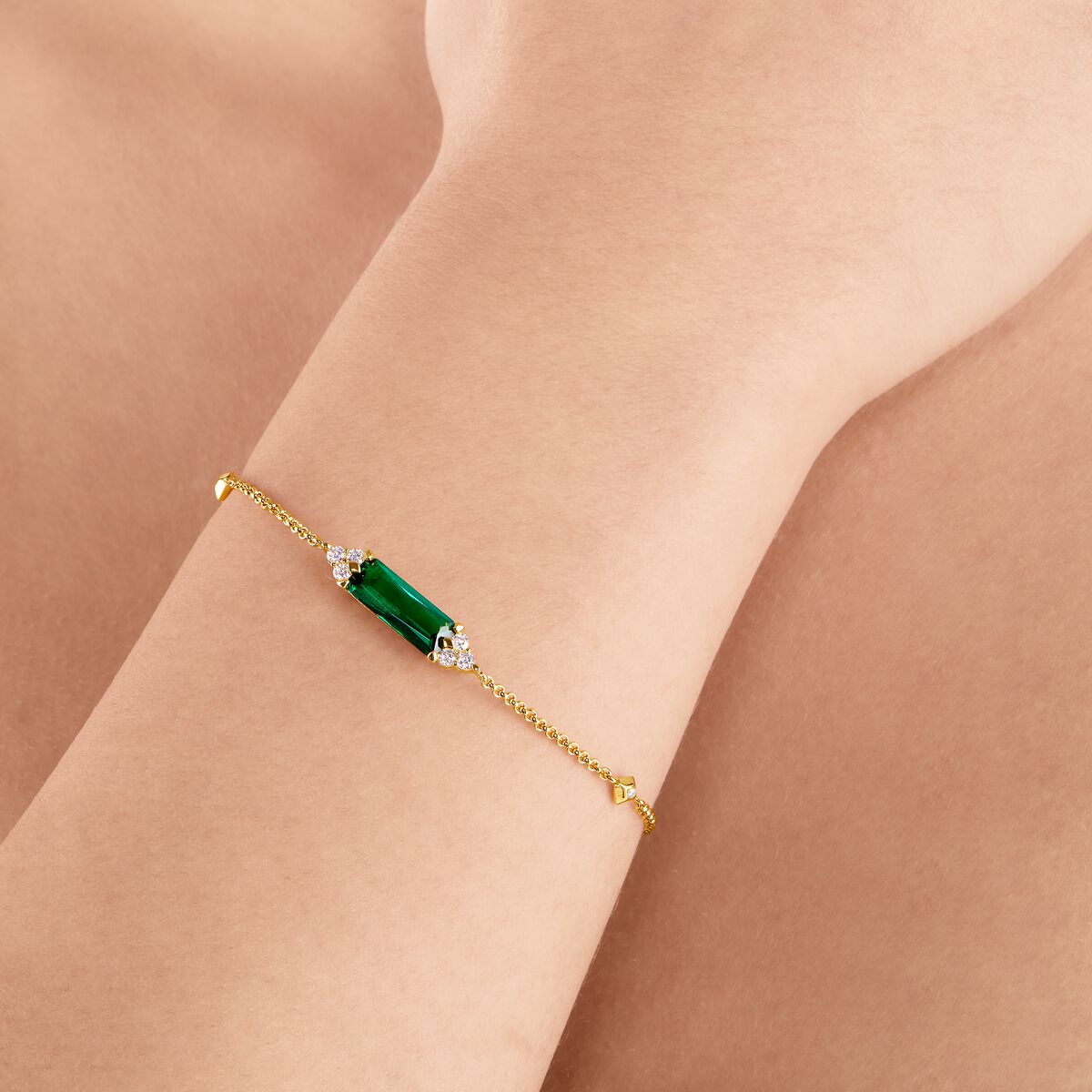 Bracelet with green and white stones gold plated