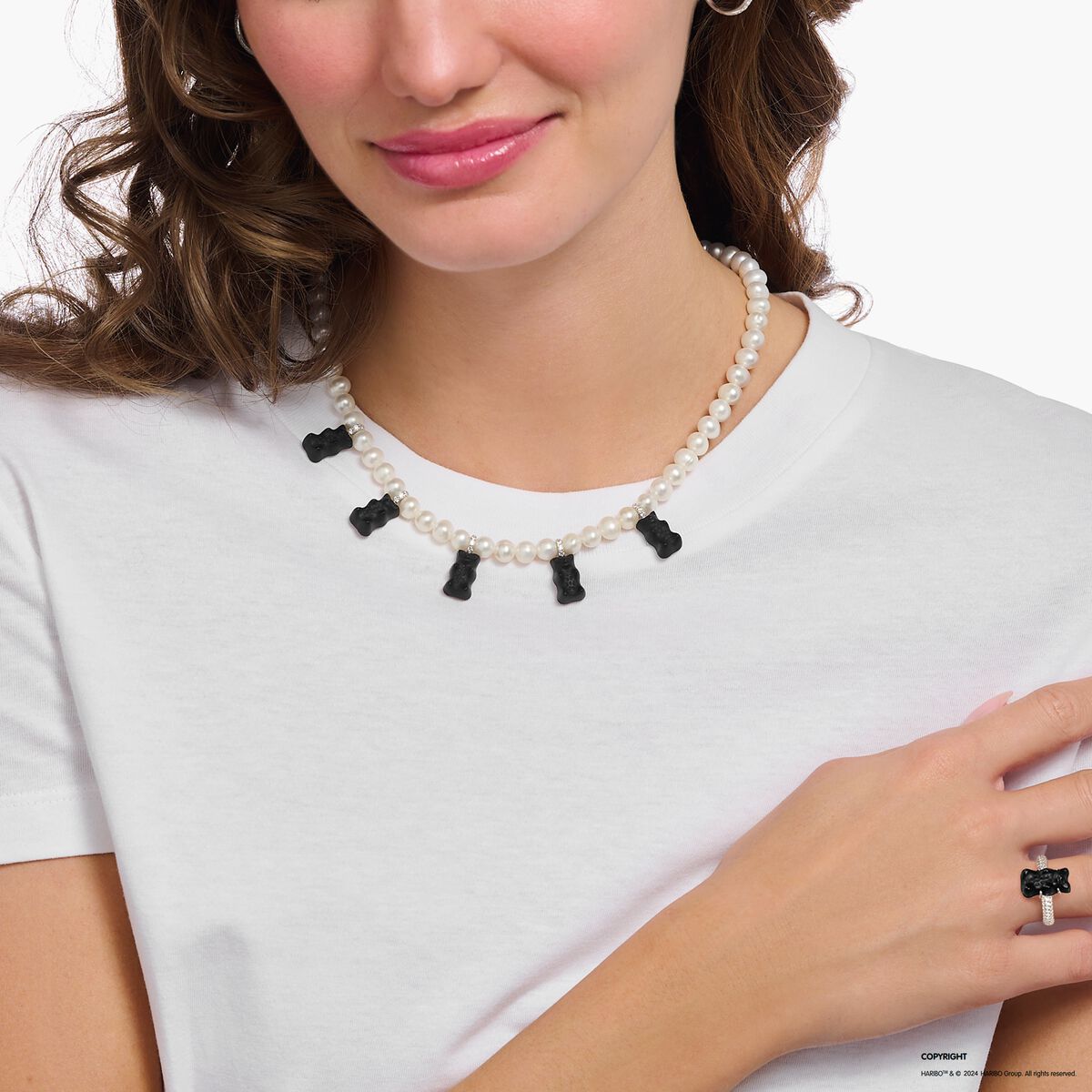 Silver pearl necklace with 5 black goldbears