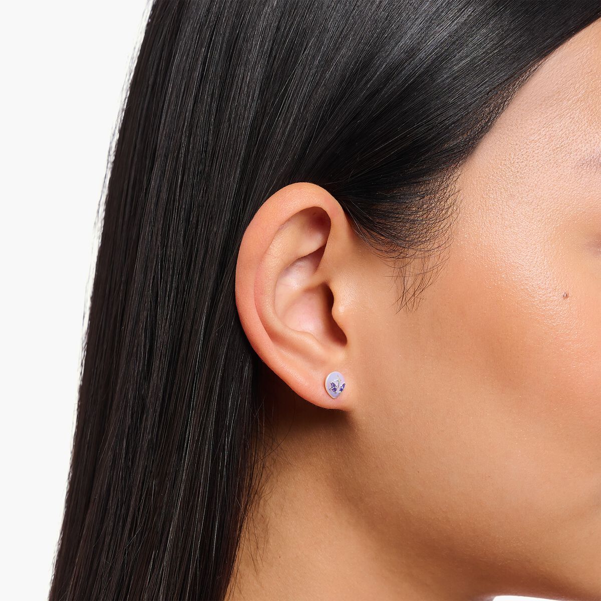 Ear studs with alien detailing and cold enamel silver