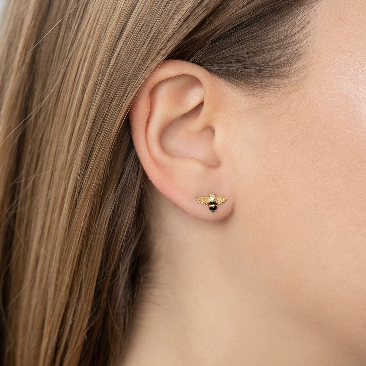 Ear studs bee