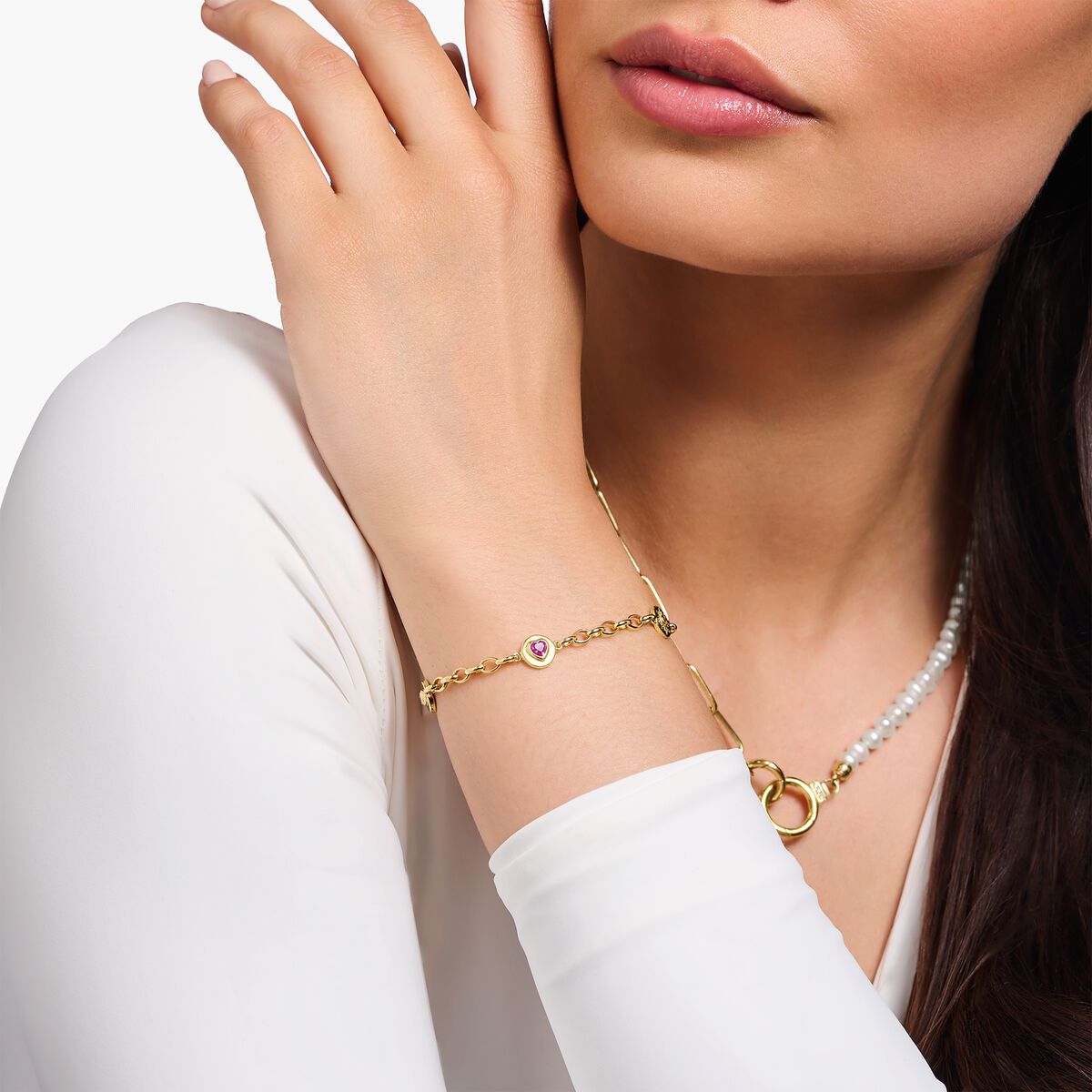 Yellow-gold plated bracelet with round elements and stones