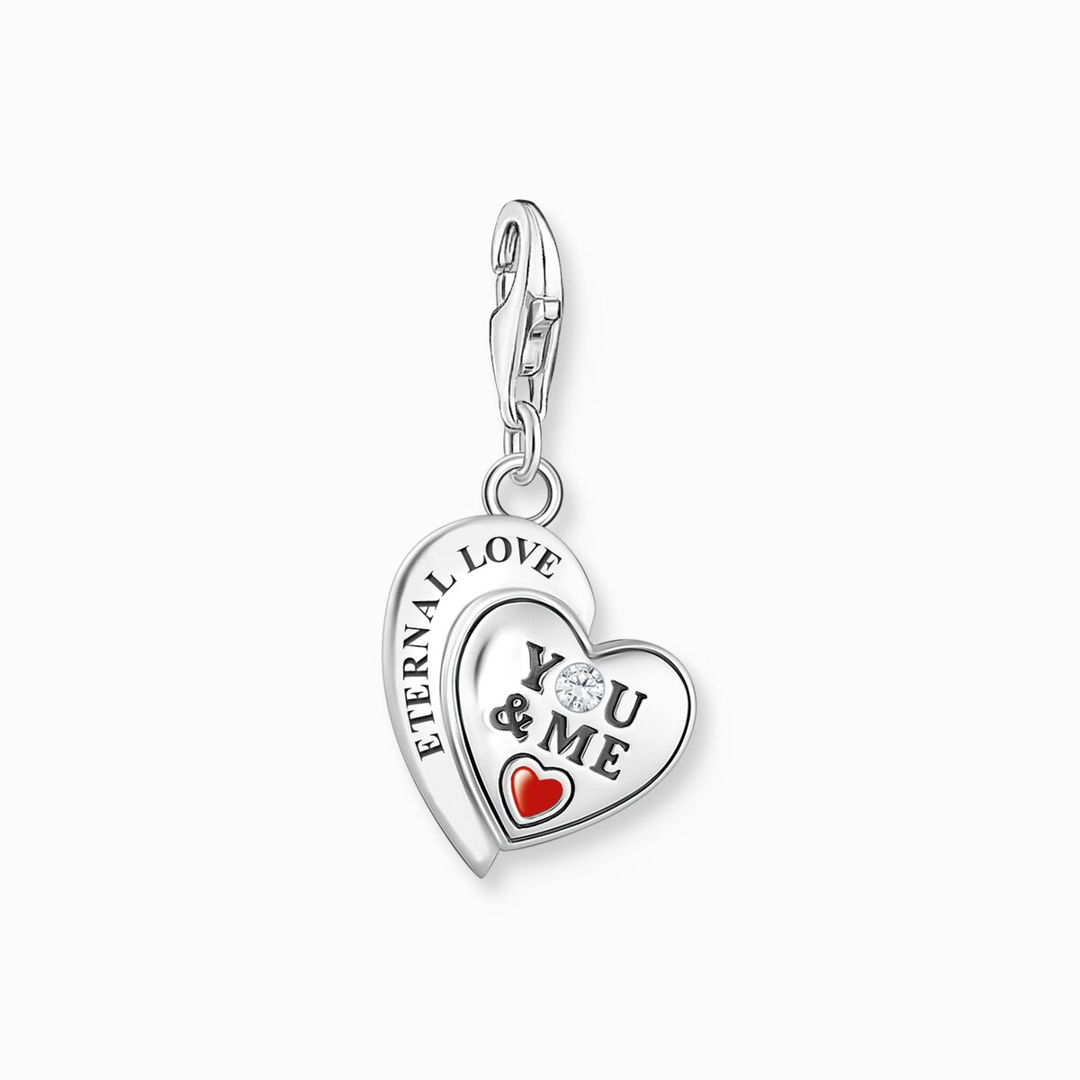 Silver charm pendant in heart-shape with engraving