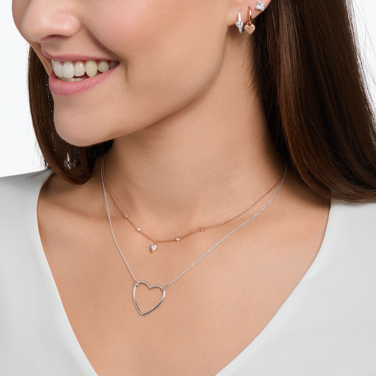 Necklace with hearts and white stones rose gold