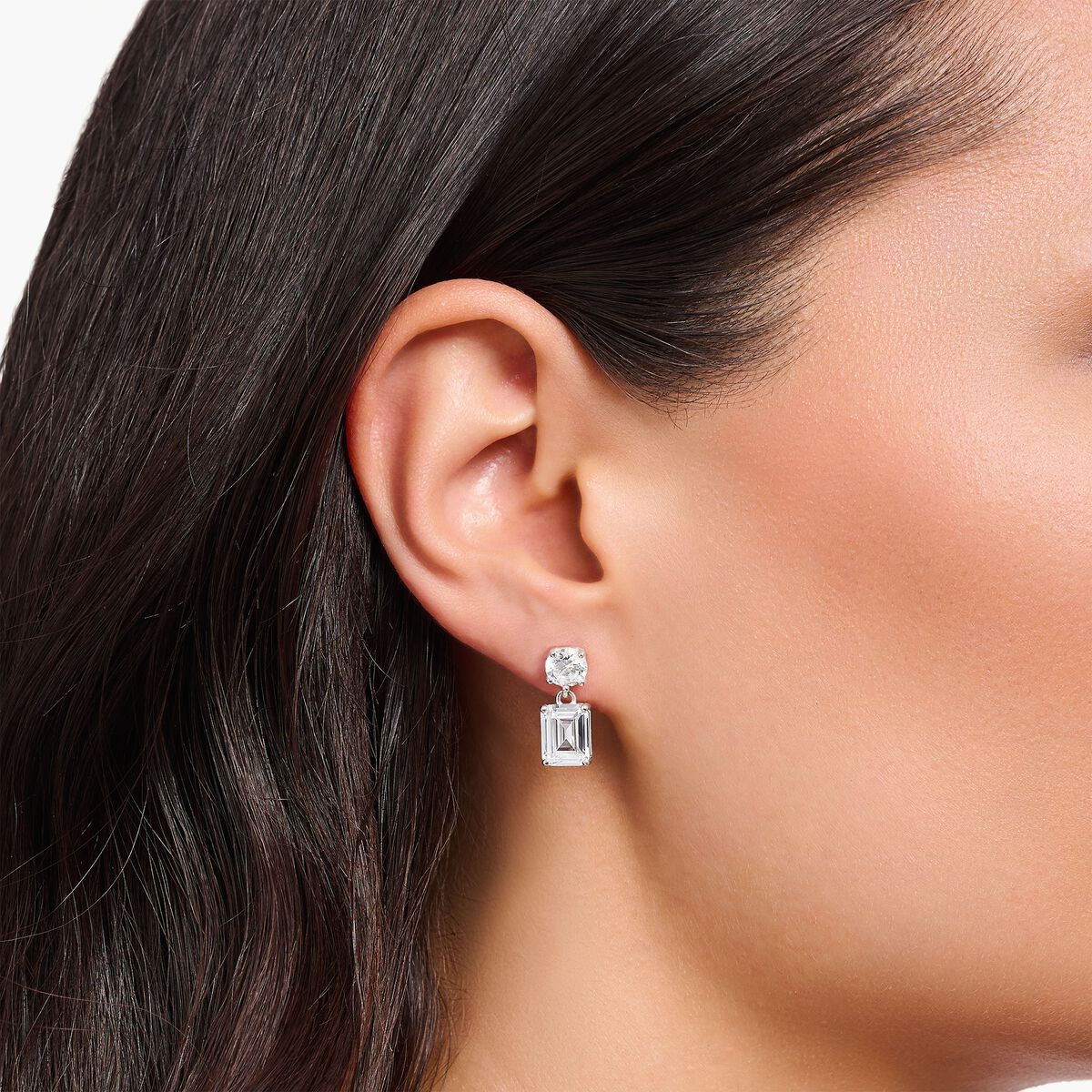 Silver earrings with white zirconia in different cuts