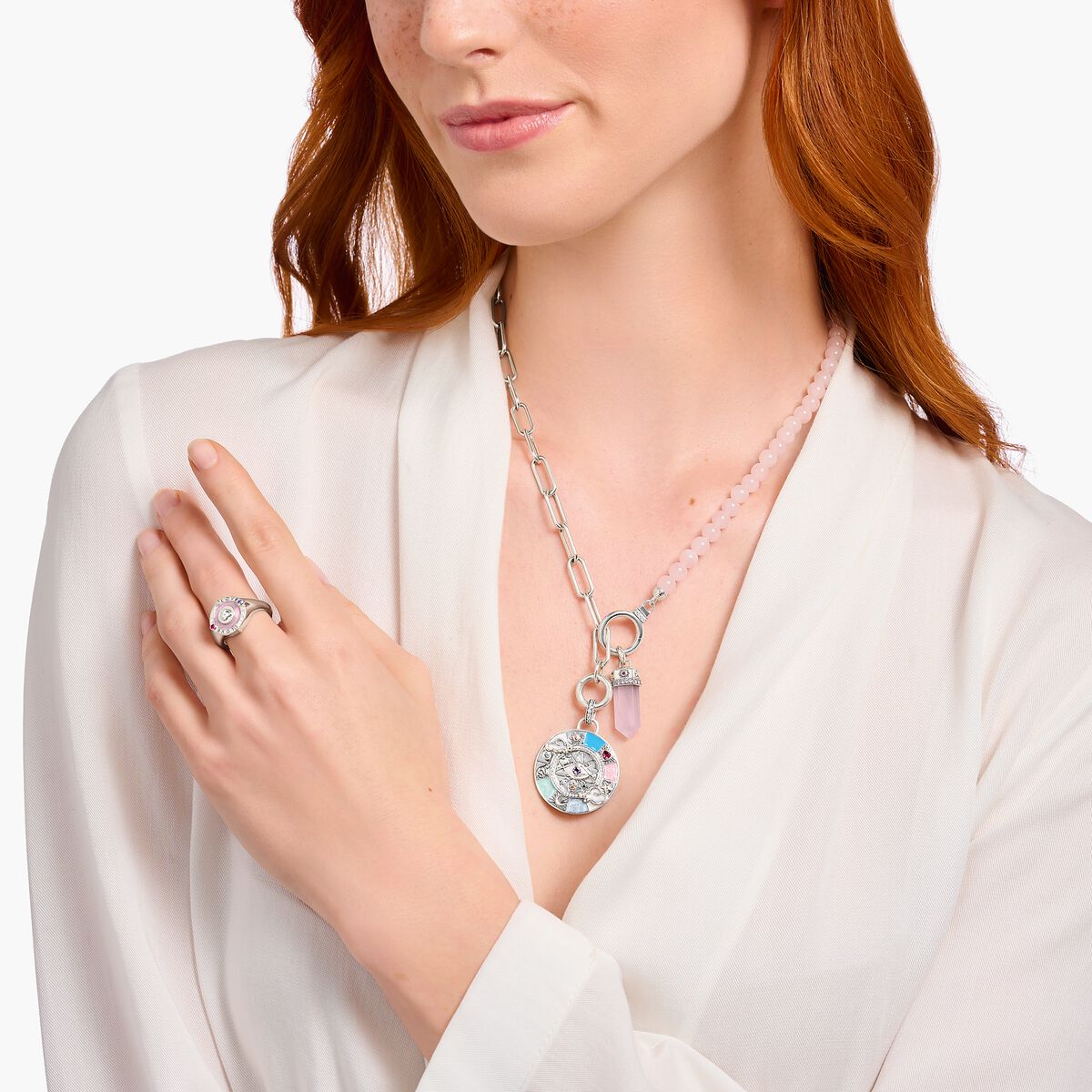 Silver necklace with link chain elements and rose quartz beads