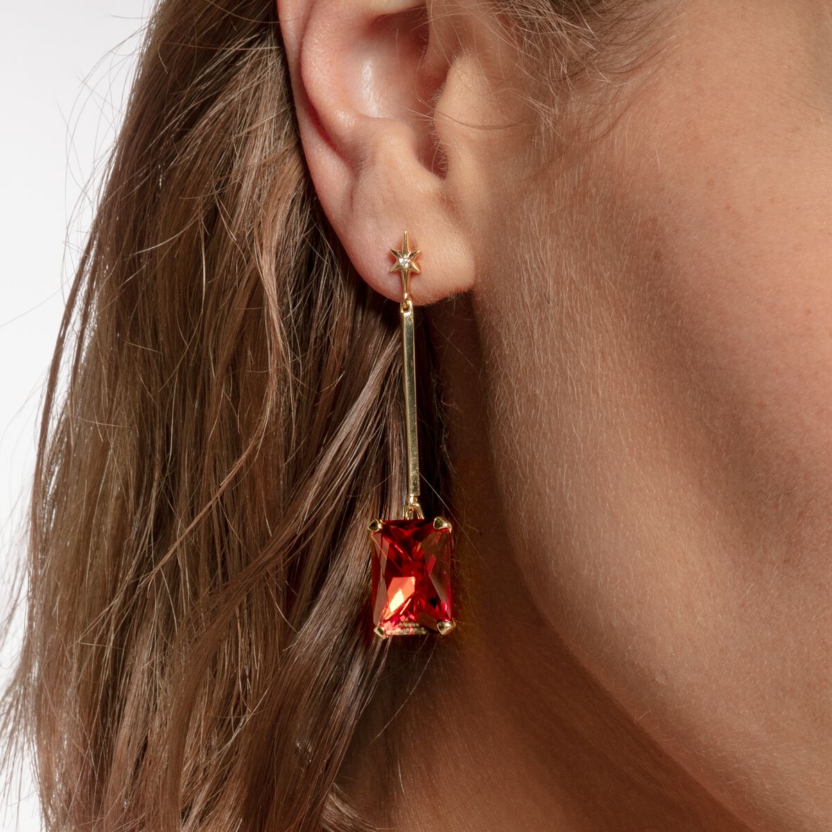 Earrings with orange stone and star gold plated