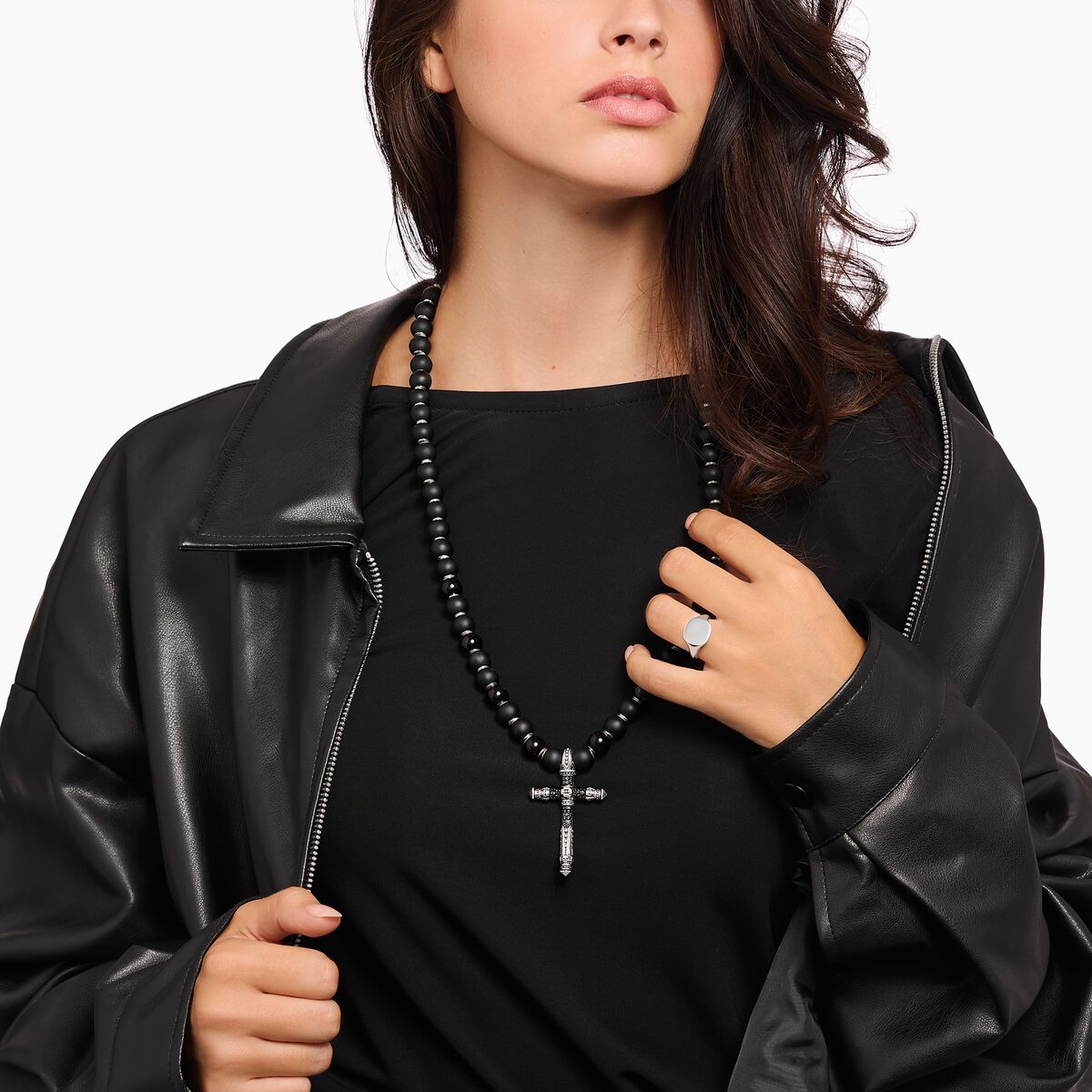 Silver blackened necklace made of black beads with cross pendant