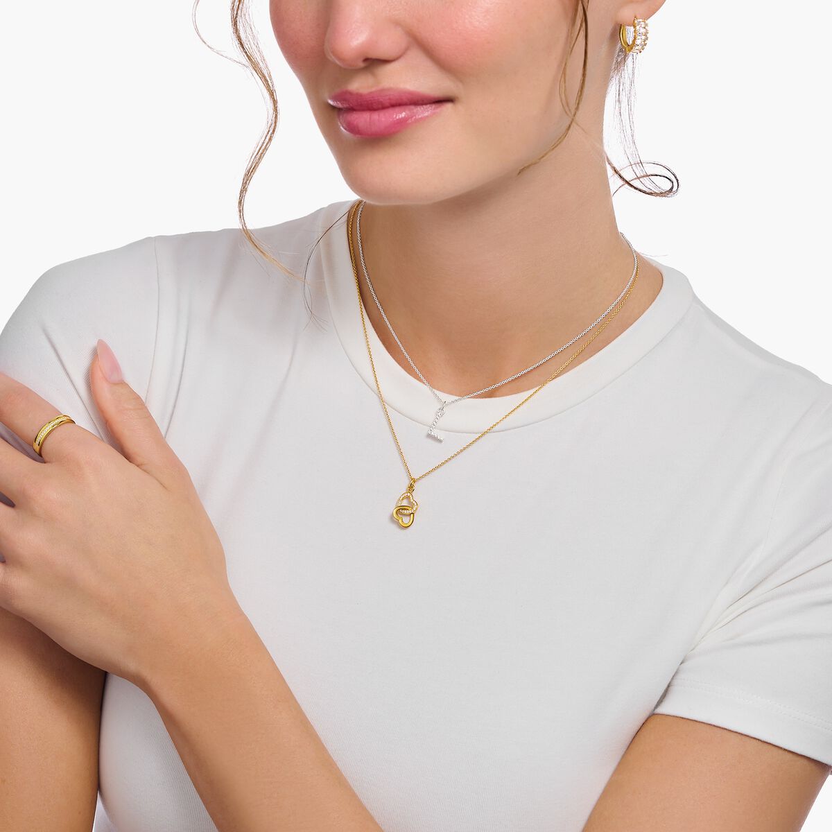 Gold-plated necklace with intertwined hearts pendant