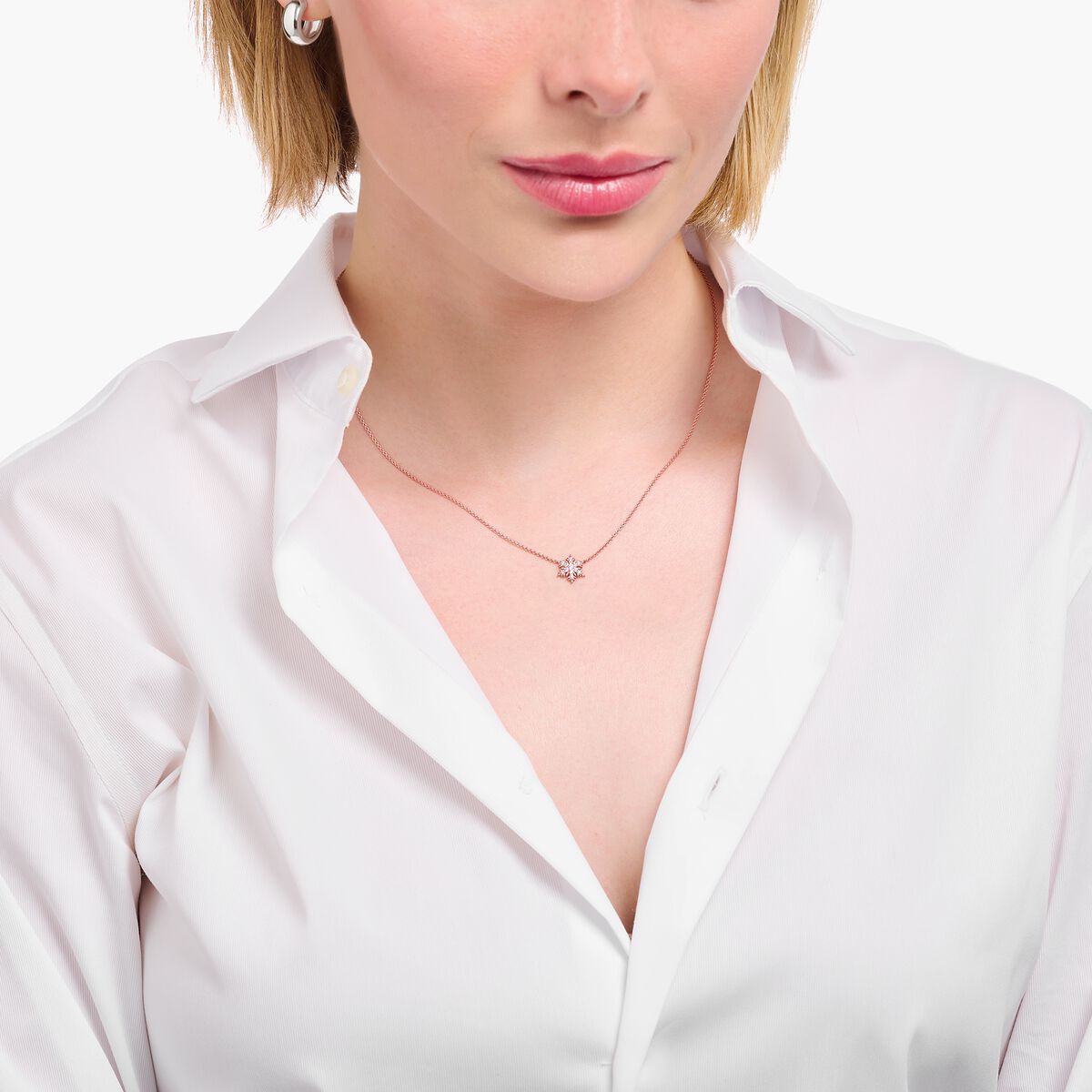 Rosé gold-plated necklace with snowflake and white zirconia