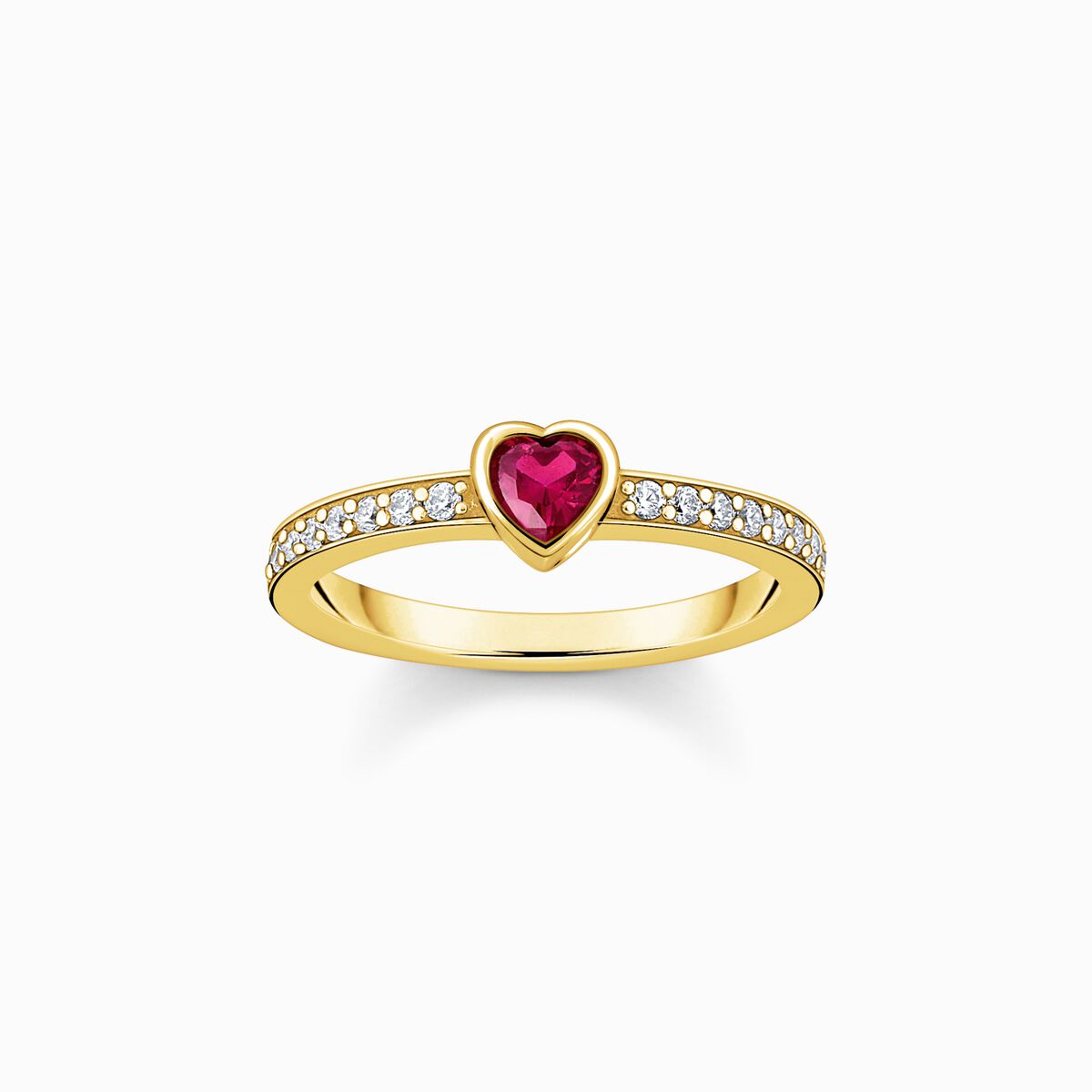 Gold-plated solitaire ring with red heart-shaped stone