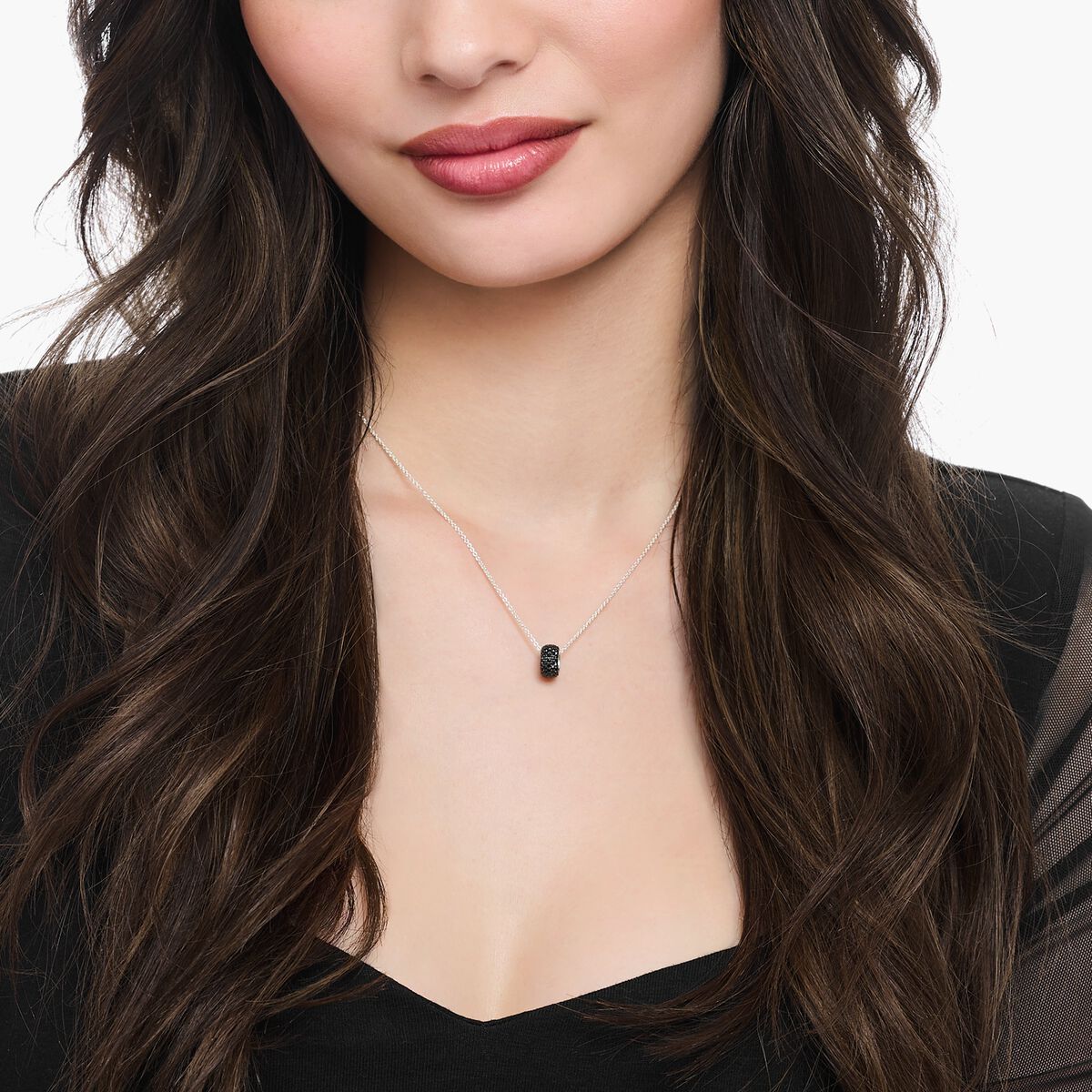 Silver necklace with ring pendant and black zirconia