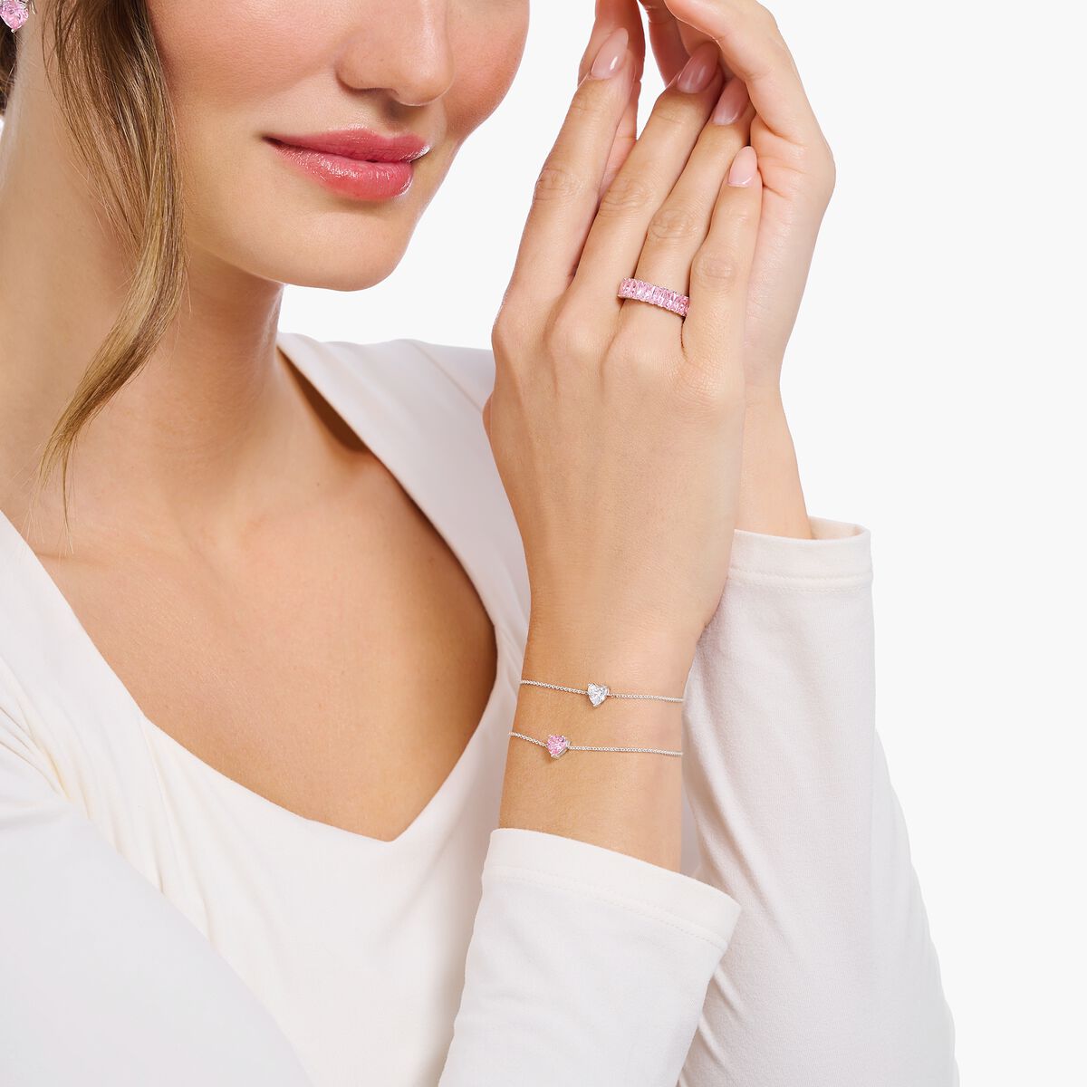 Silver bracelet with pink heart-shaped pendant